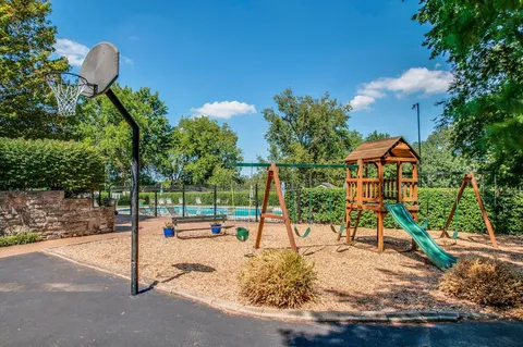 a view of a park with slide