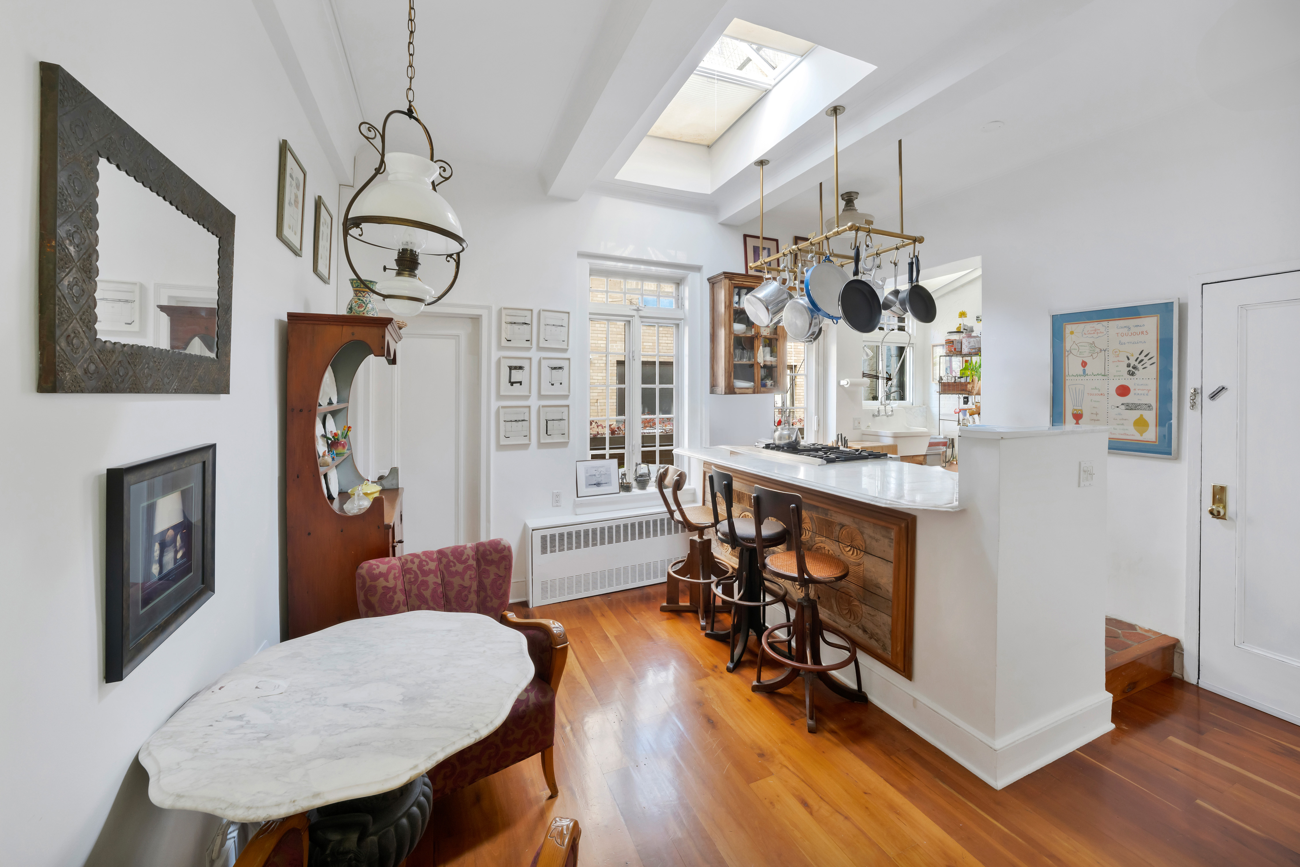 320 East 57th Street, Unit PHA Manhattan, NY 10022 - Photo 8 of 11 a view of a dining room with furniture and wooden floor