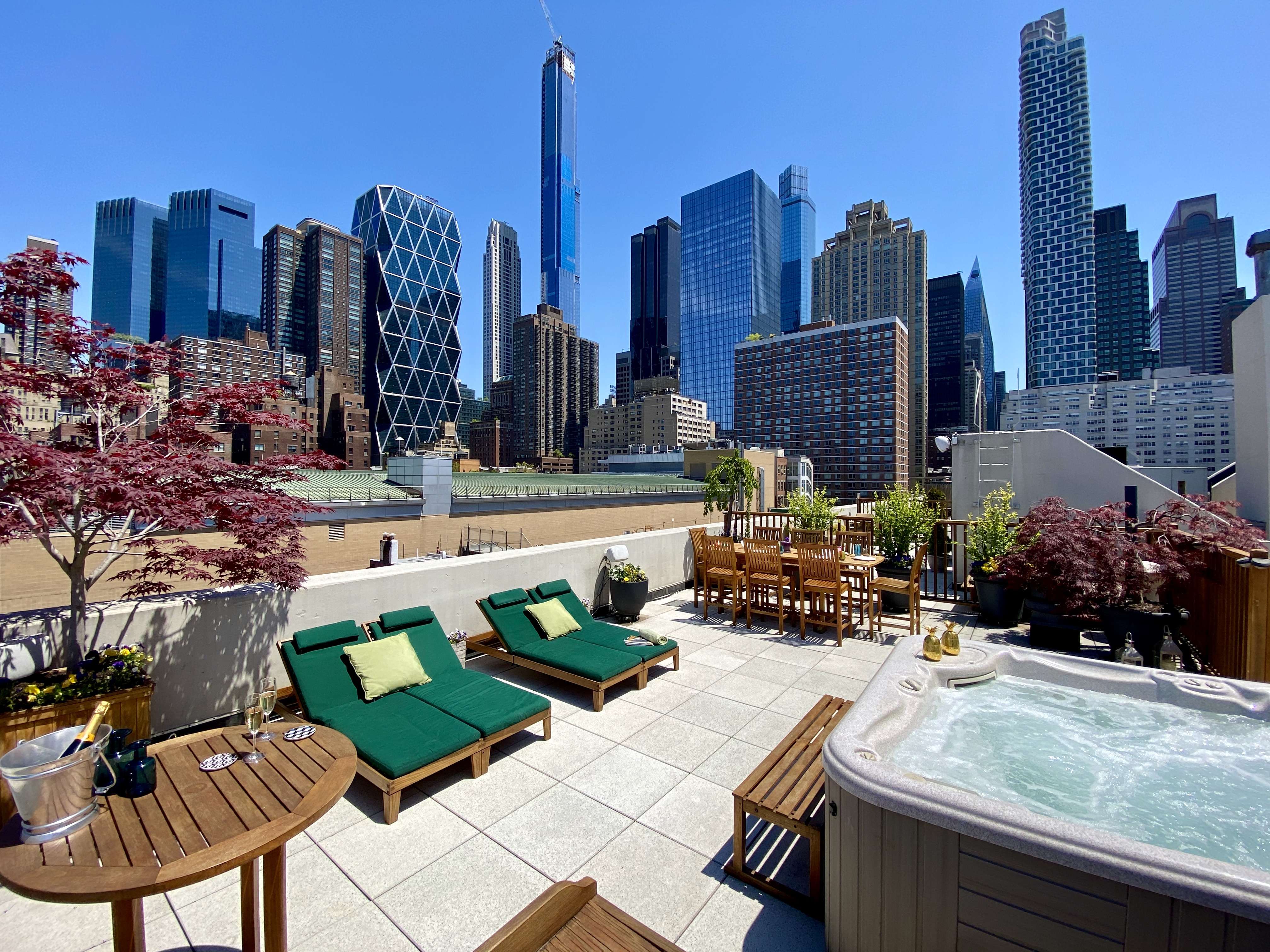 350 West 53rd Street, Unit PHB Manhattan, NY 10019 - Photo 22 of 34 a view of a chairs and table in patio