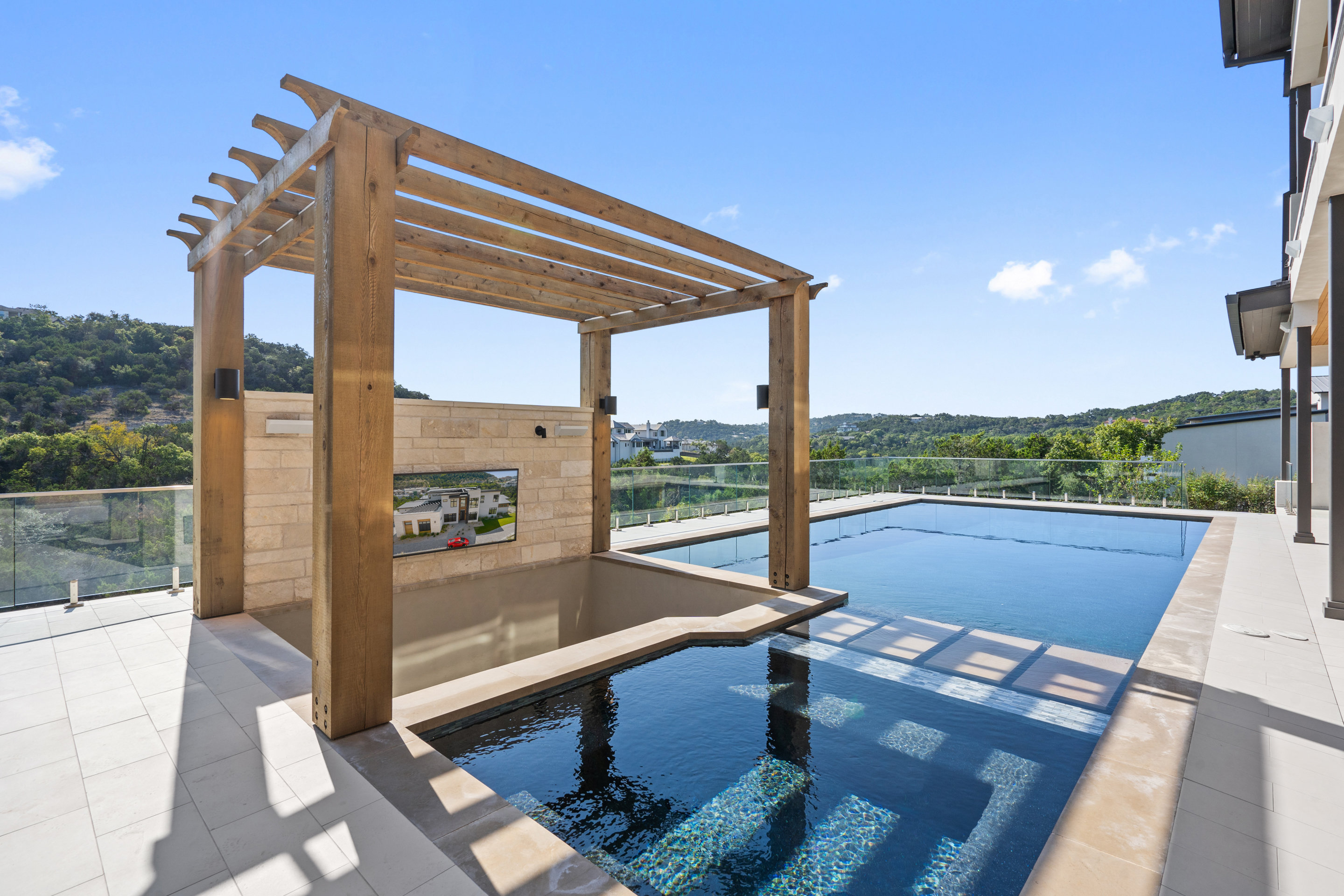 1905 Hallam Drive Austin, TX 78746 - Photo 36 of 39 a view of balcony with couch and outdoor view