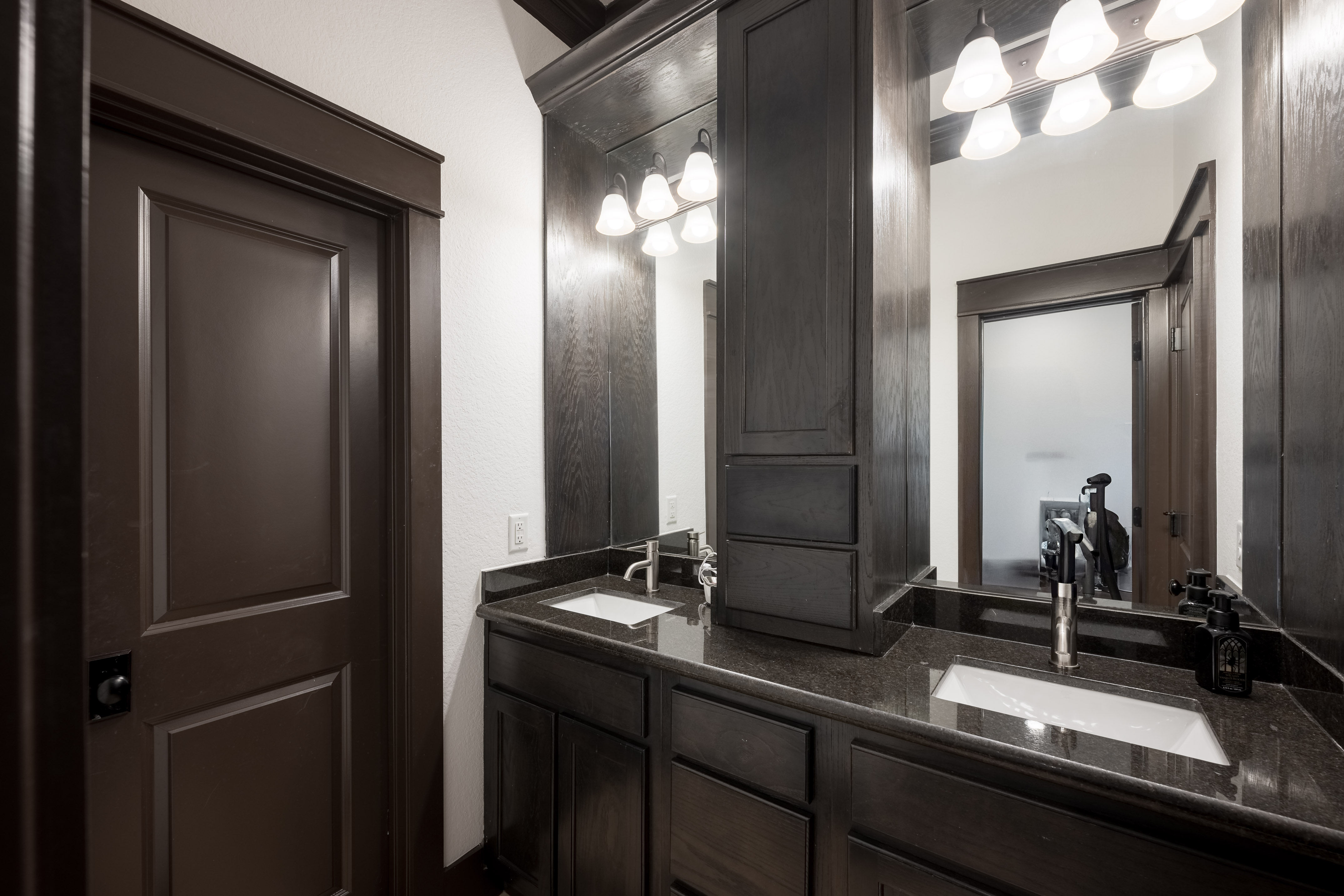 406 Fenn Street Houston, TX 77018 - Photo 24 of 33 a bathroom with a double vanity sink and a mirror