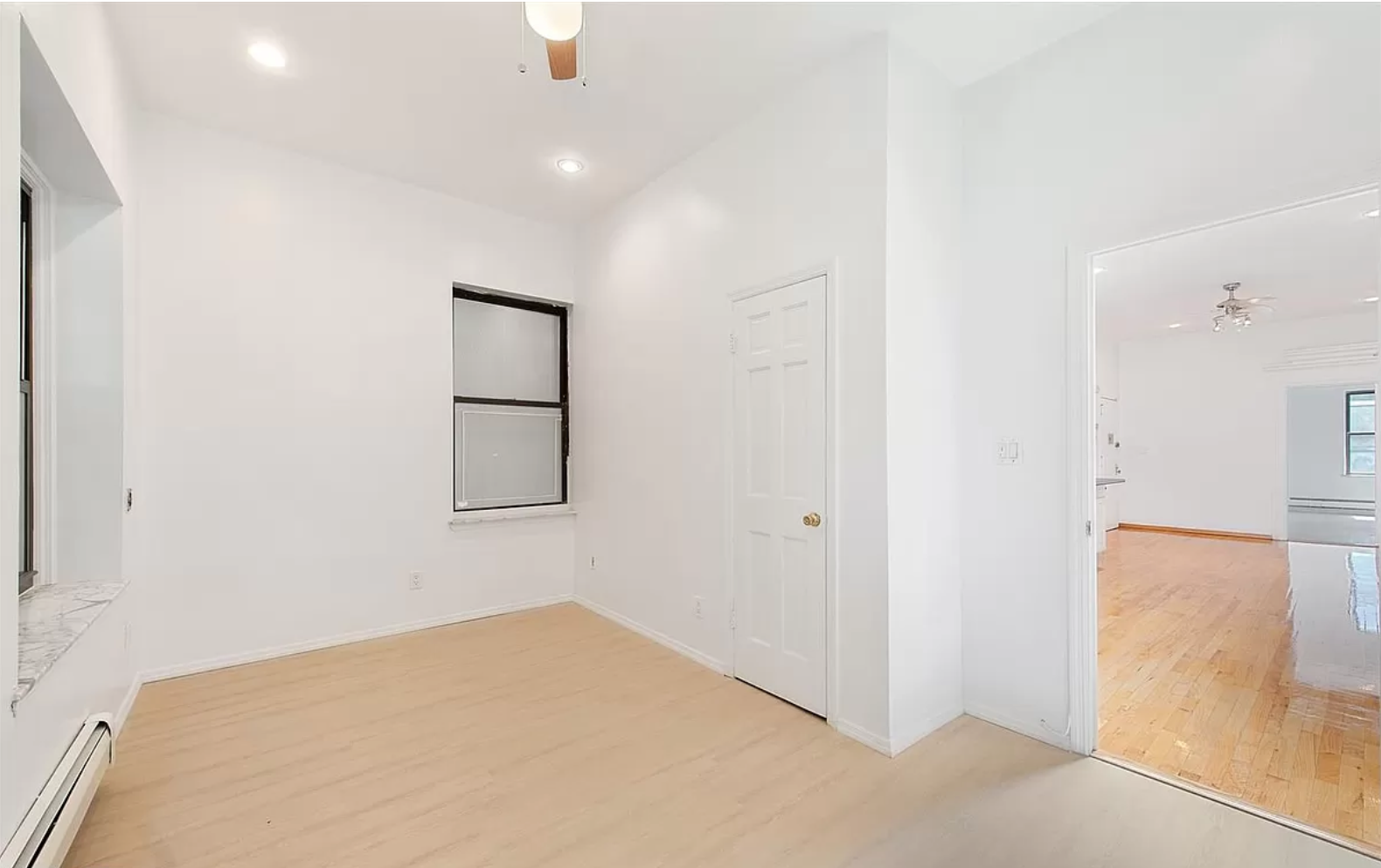 218 3rd Avenue, Unit 2 Manhattan, NY 10003 - Photo 7 of 9 an empty room with windows and closet