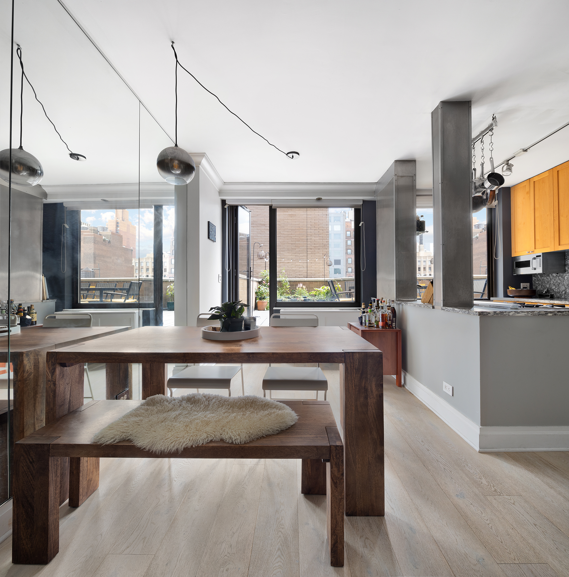 111 East 30th Street, Unit 16C Manhattan, NY 10016 - Photo 6 of 13 a large white kitchen with a large window