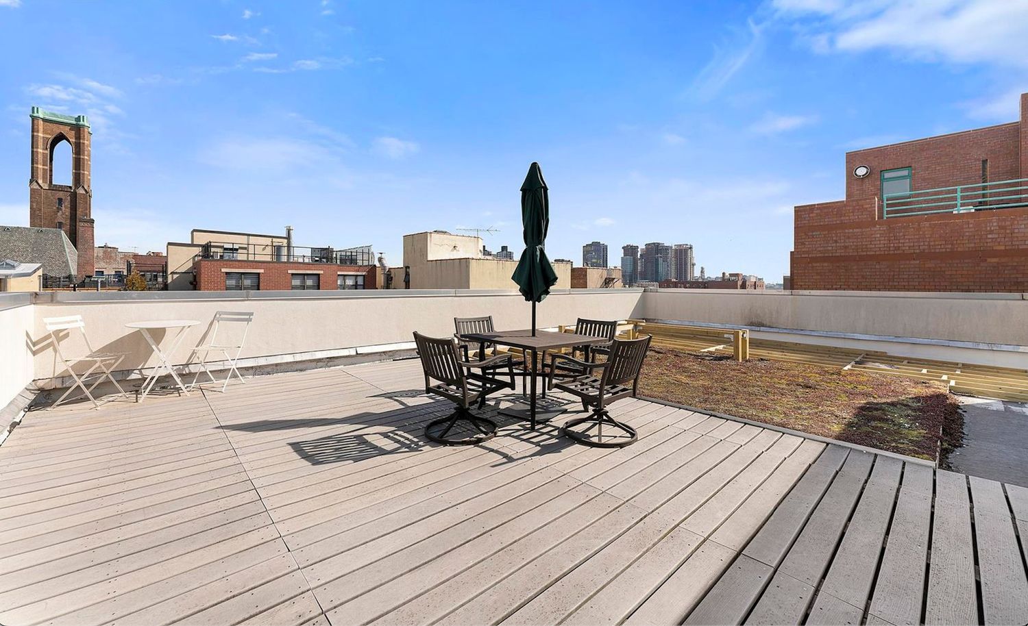 51 East 128th Street, Unit 1C Manhattan, NY 10035 - Photo 7 of 9 a view of a terrace with seating area