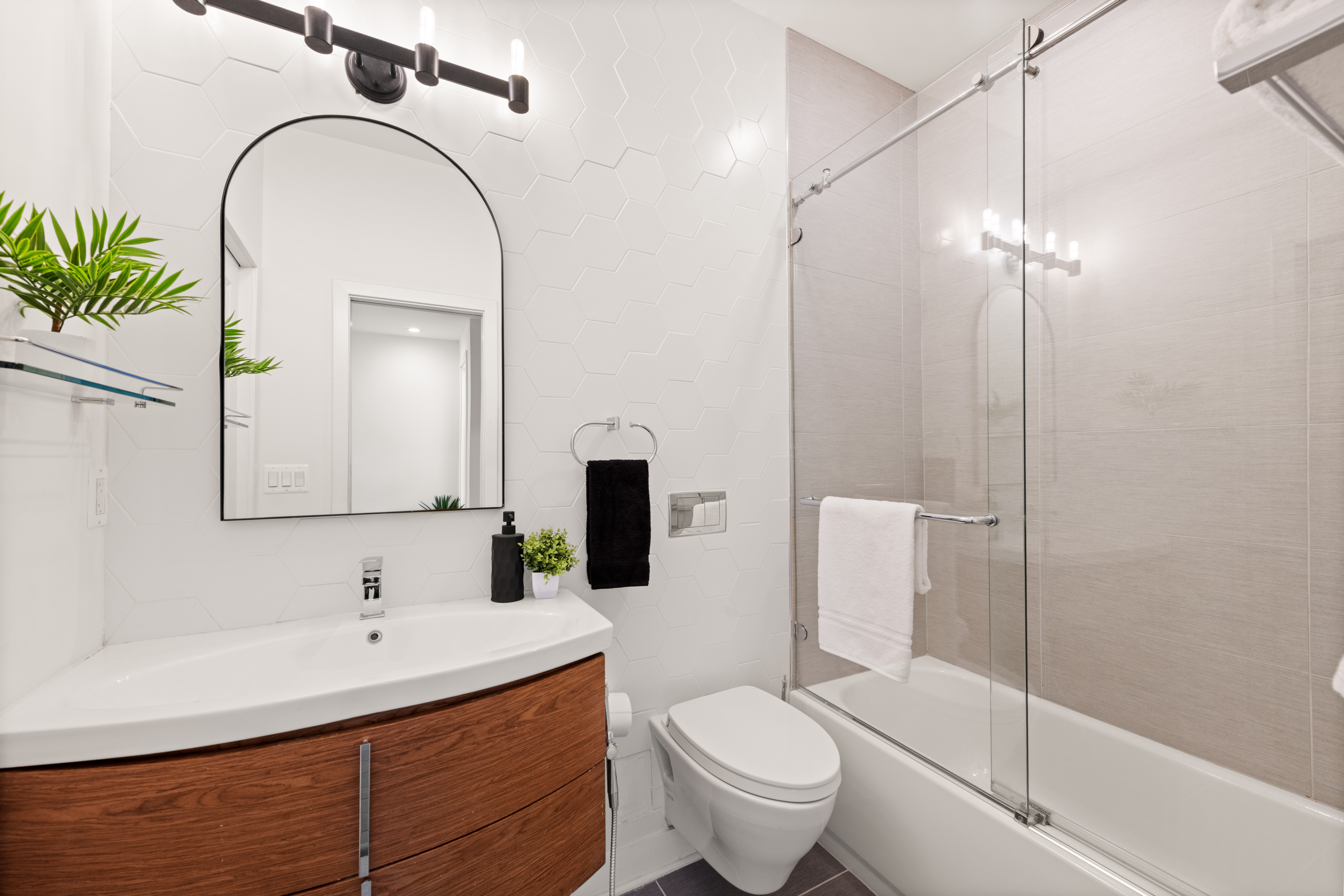 319 Varnum Street Northwest, Unit 3 Washington, DC 20011 - Photo 16 of 29 a bathroom with a sink toilet and shower