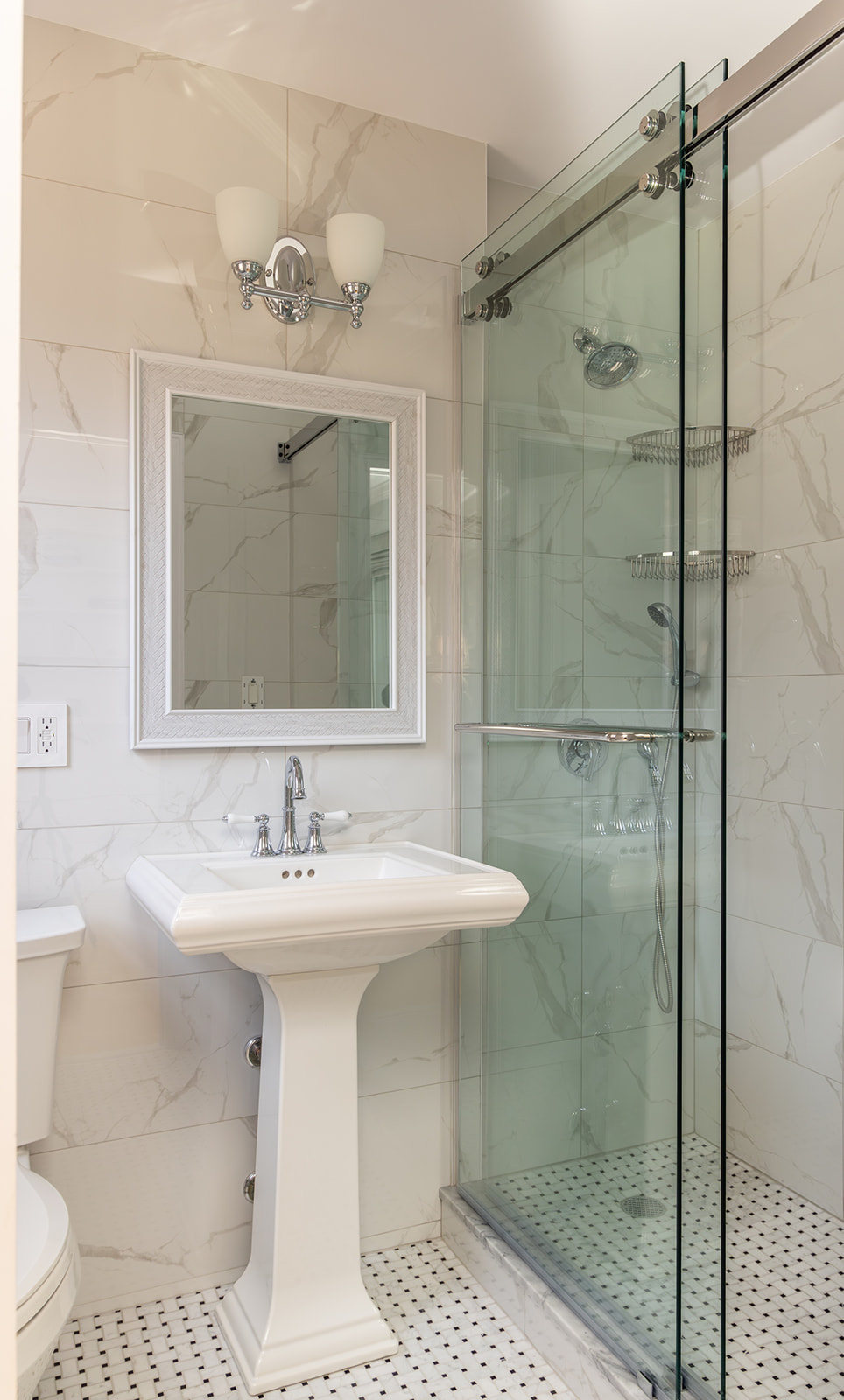132 East 35th Street, Unit 7H Manhattan, NY 10016 - Photo 13 of 25 a bathroom with a sink toilet and shower