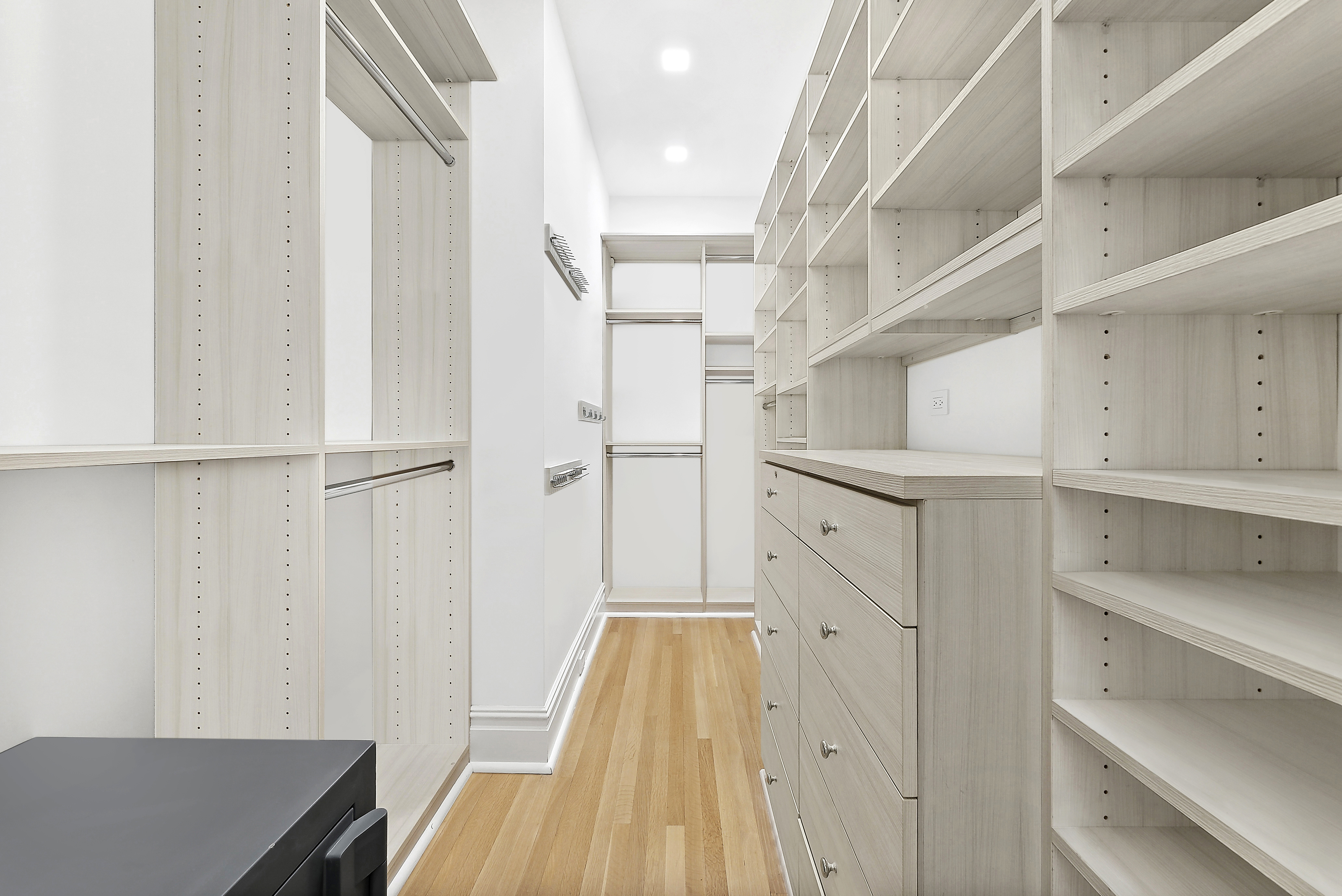 390 West End Avenue, Unit 4J Manhattan, NY 10024 - Photo 8 of 17 a view of walk in closet with empty racks