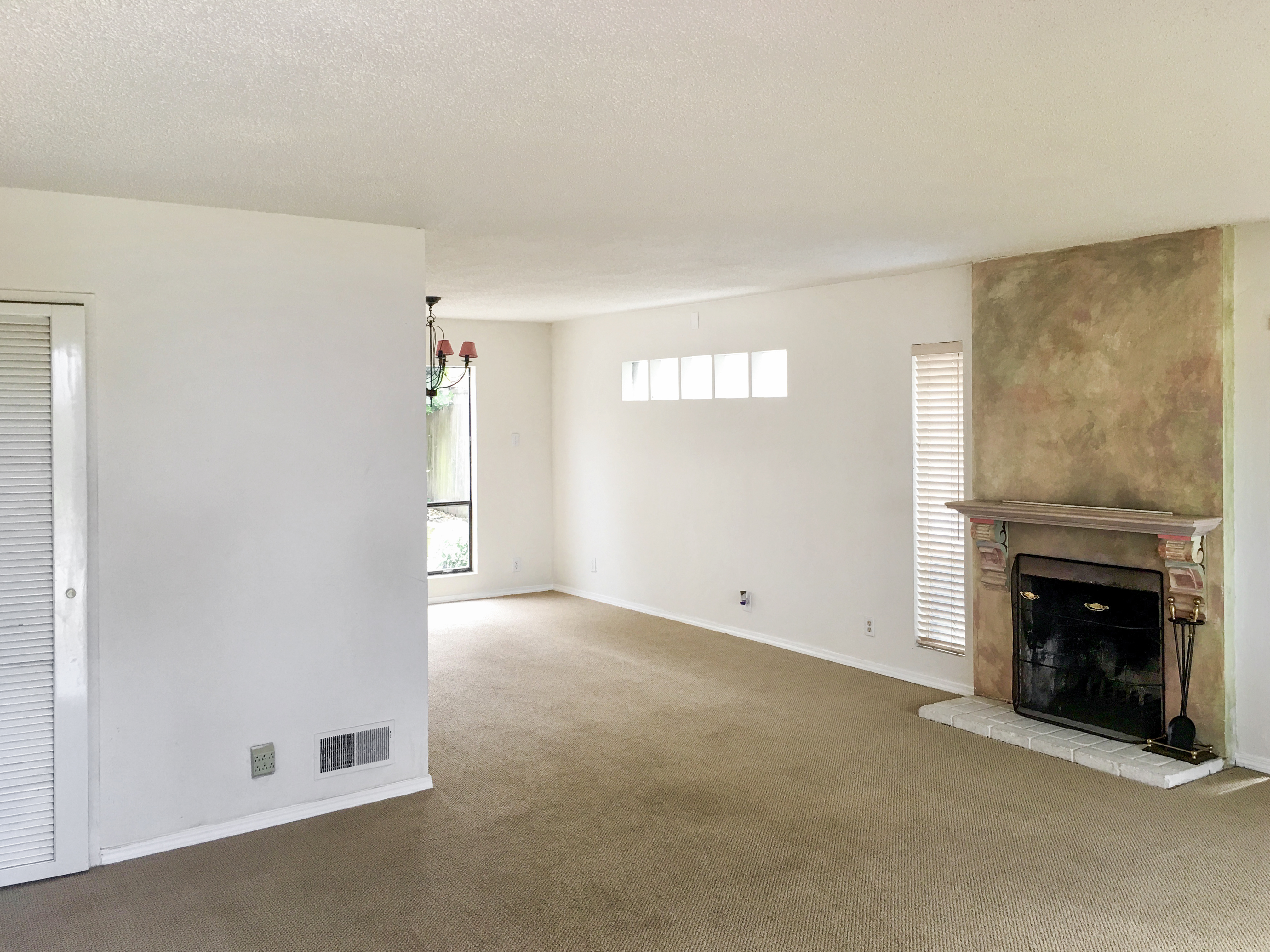 371 Inverness Drive Pacifica, CA 94044 - Photo 3 of 15 an empty room with fireplace