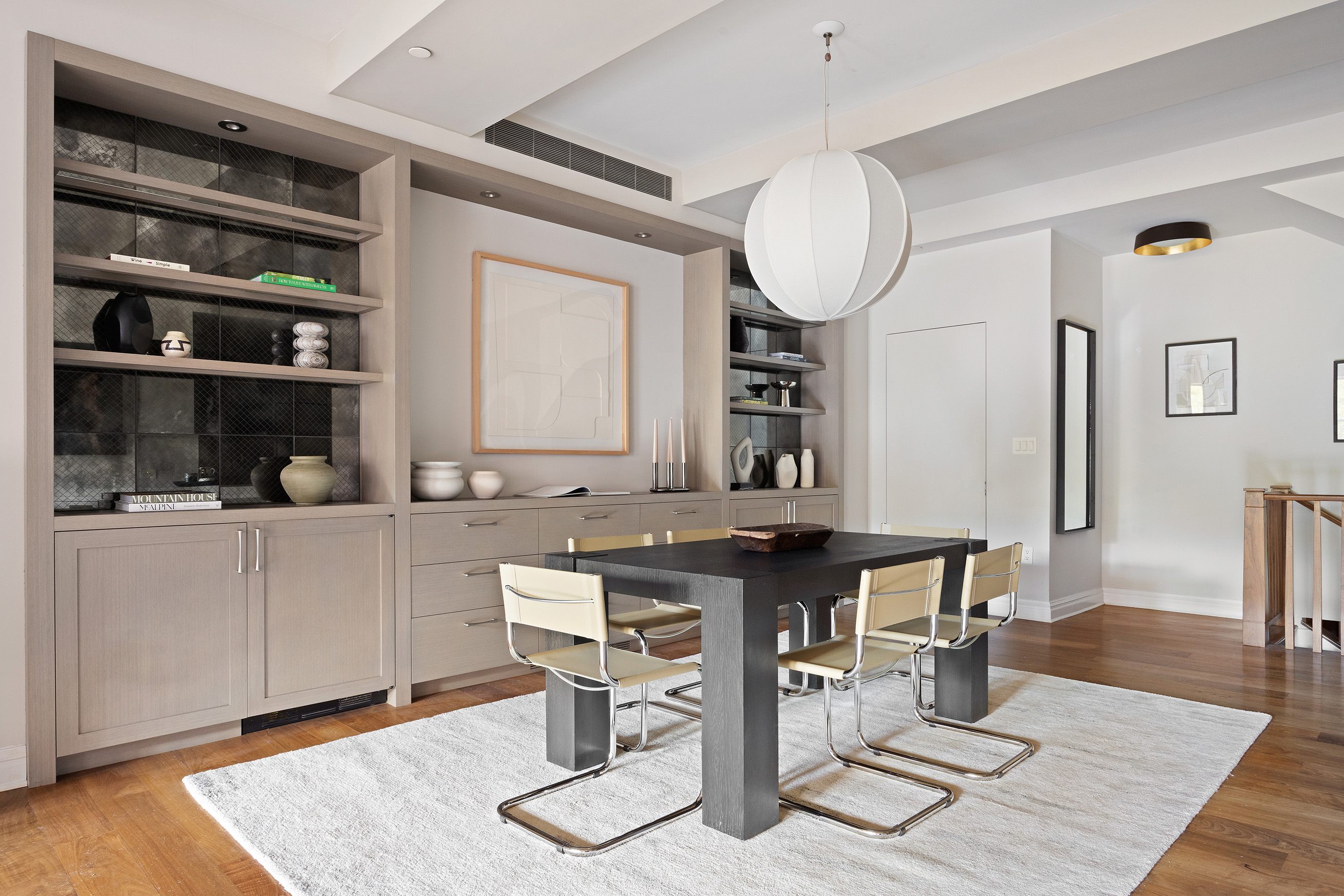 161 Duane Street, Unit 4B Manhattan, NY 10013 - Photo 5 of 16 a room with table chairs and wooden floor