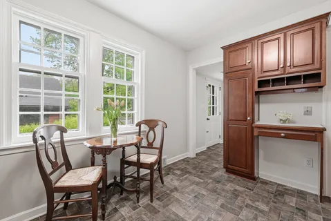 a kitchen with stainless steel appliances granite countertop a stove refrigerator and a sink