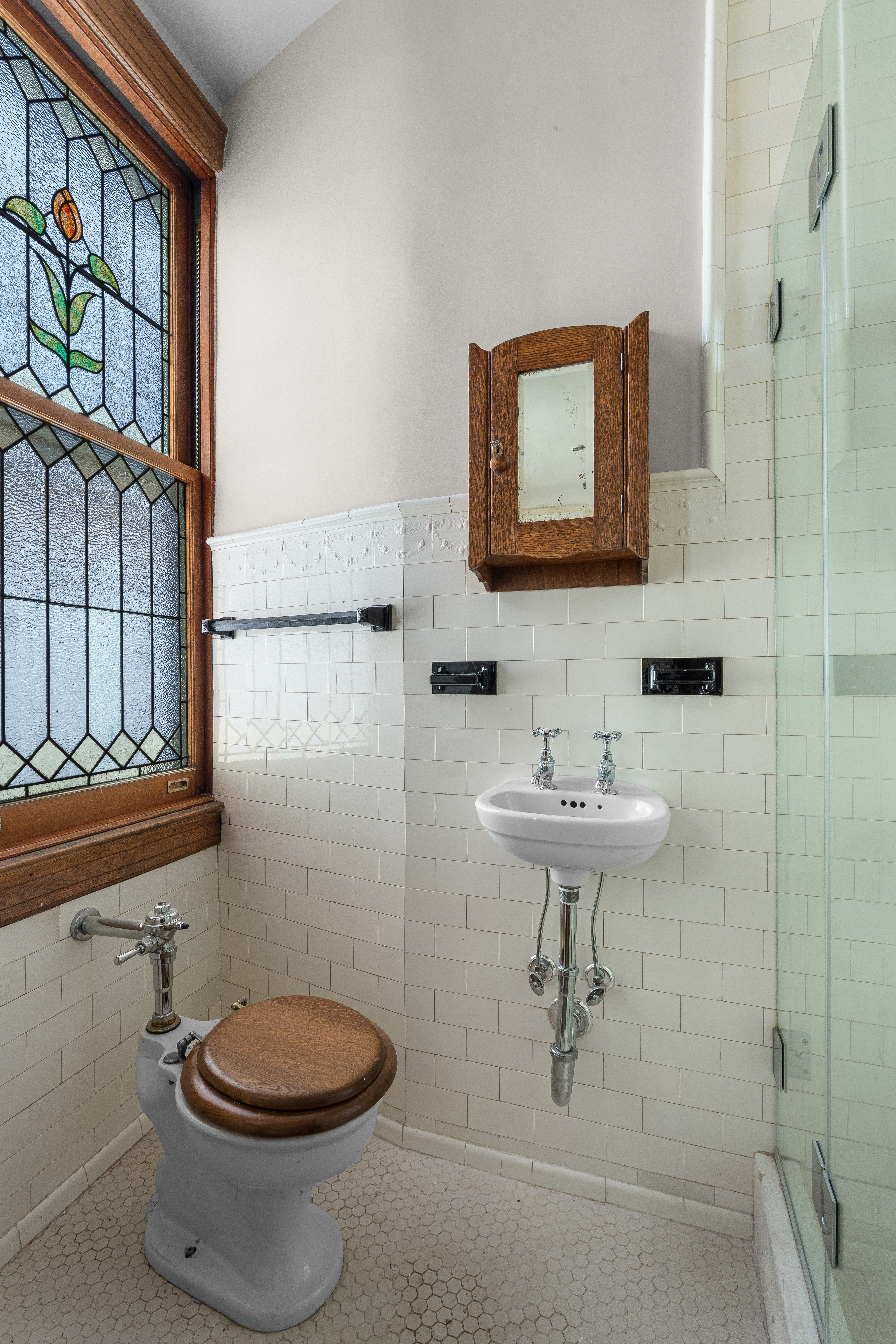 645 West End Avenue, Unit 11D Manhattan, NY 10025 - Photo 9 of 21 a bathroom with a sink a toilet and shower