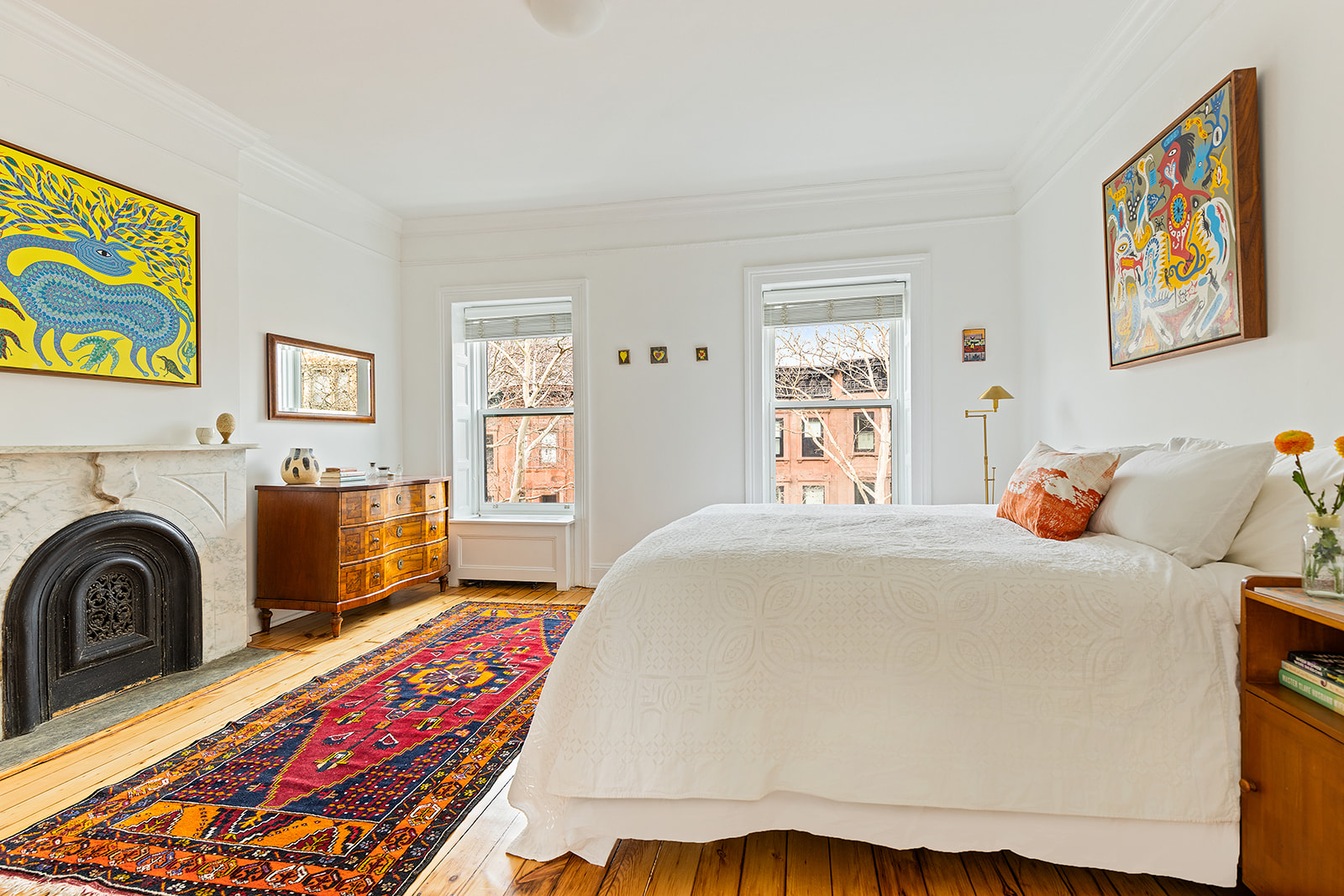 146 Berkeley Place Brooklyn, NY 11217 - Photo 8 of 21 a bedroom with a bed and a couch