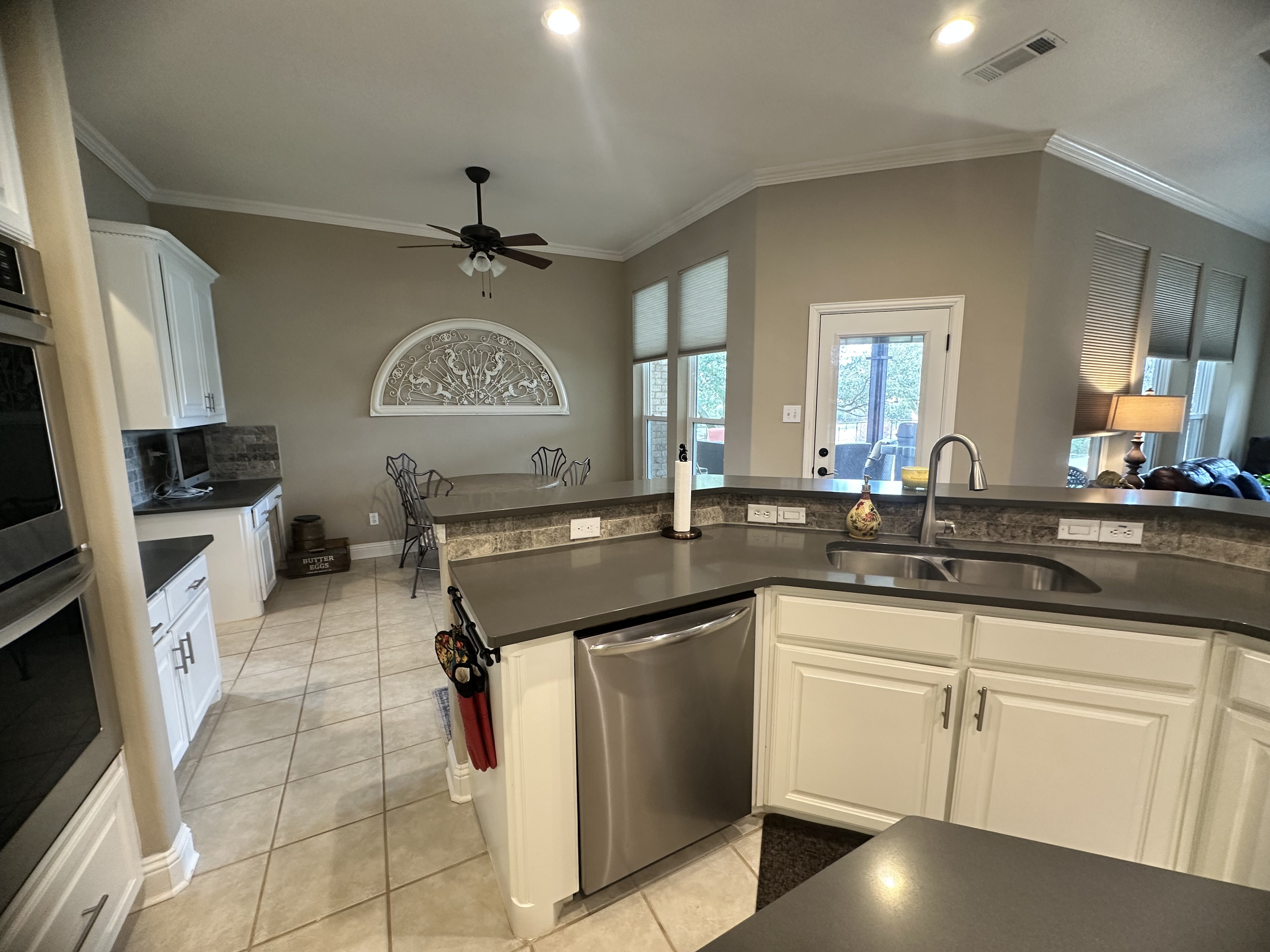 3588 Heritage Trail Celina, TX 75009 - Photo 8 of 19 a kitchen with a sink cabinets and window