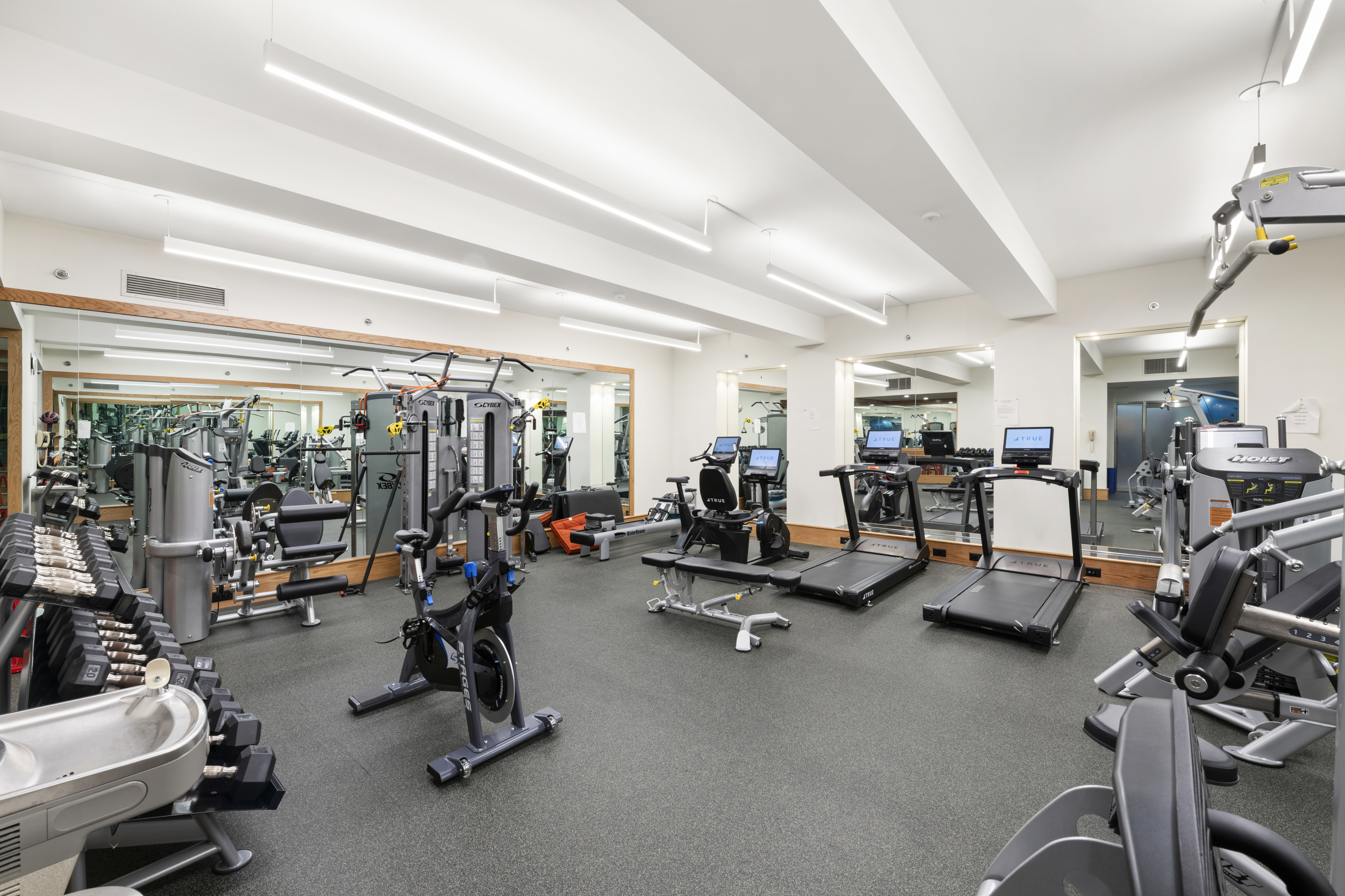 110 East 57th Street, Unit 16B Manhattan, NY 10022 - Photo 13 of 15 a view of a room with gym equipment