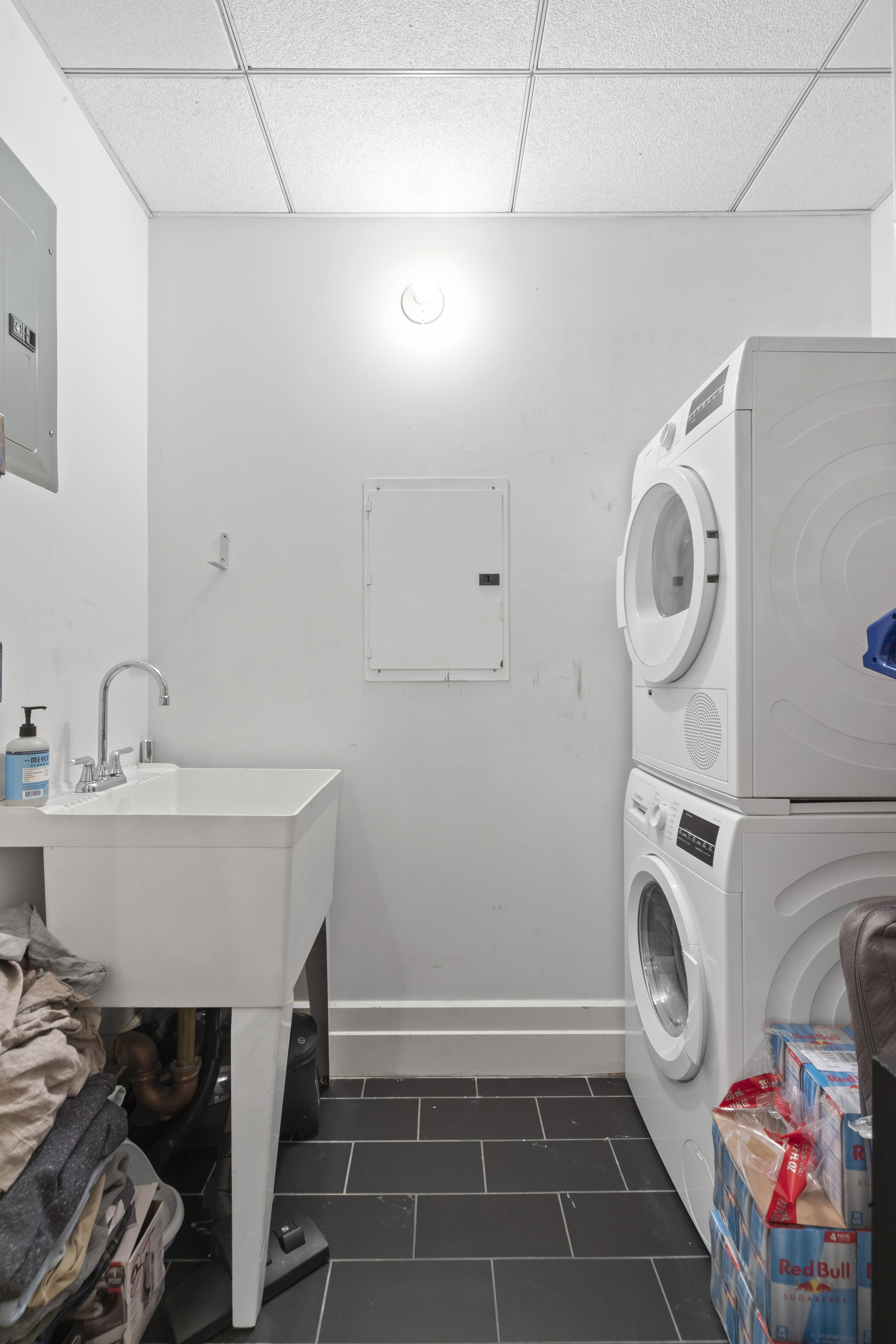 70 Washington Street, Unit 2T Brooklyn, NY 11201 - Photo 7 of 11 a bathroom with a sink and a washing machine