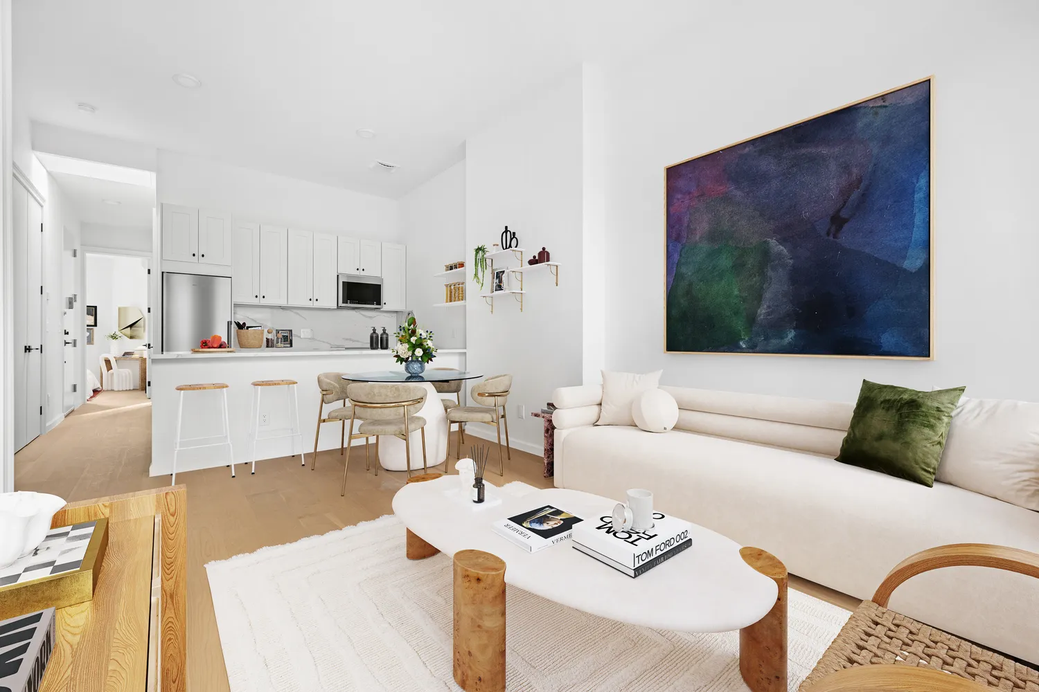 a living room with furniture and white walls