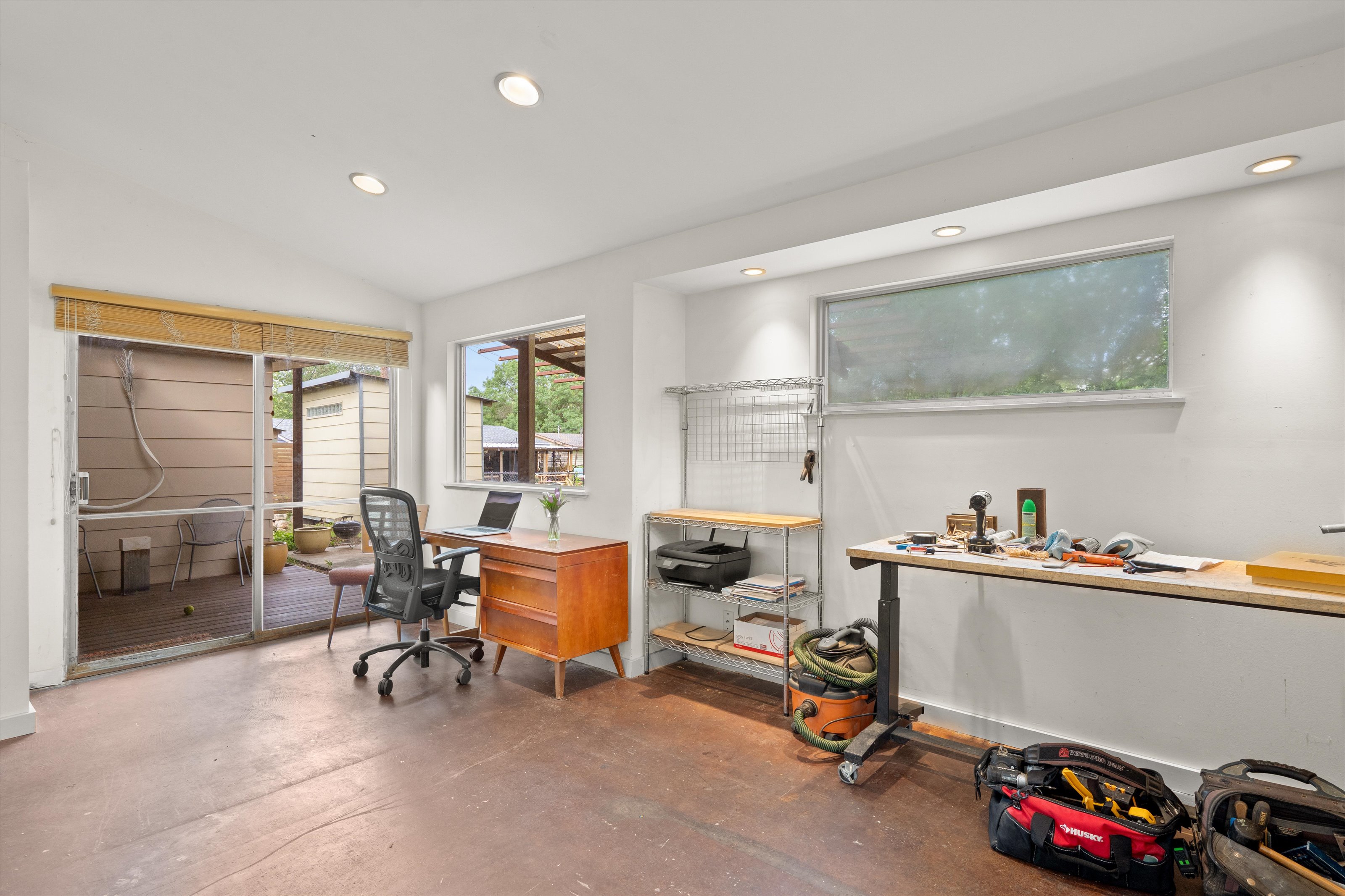 4614 Jinx Avenue Austin, TX 78745 - Photo 31 of 40 a view of a workspace with furniture and a livingroom