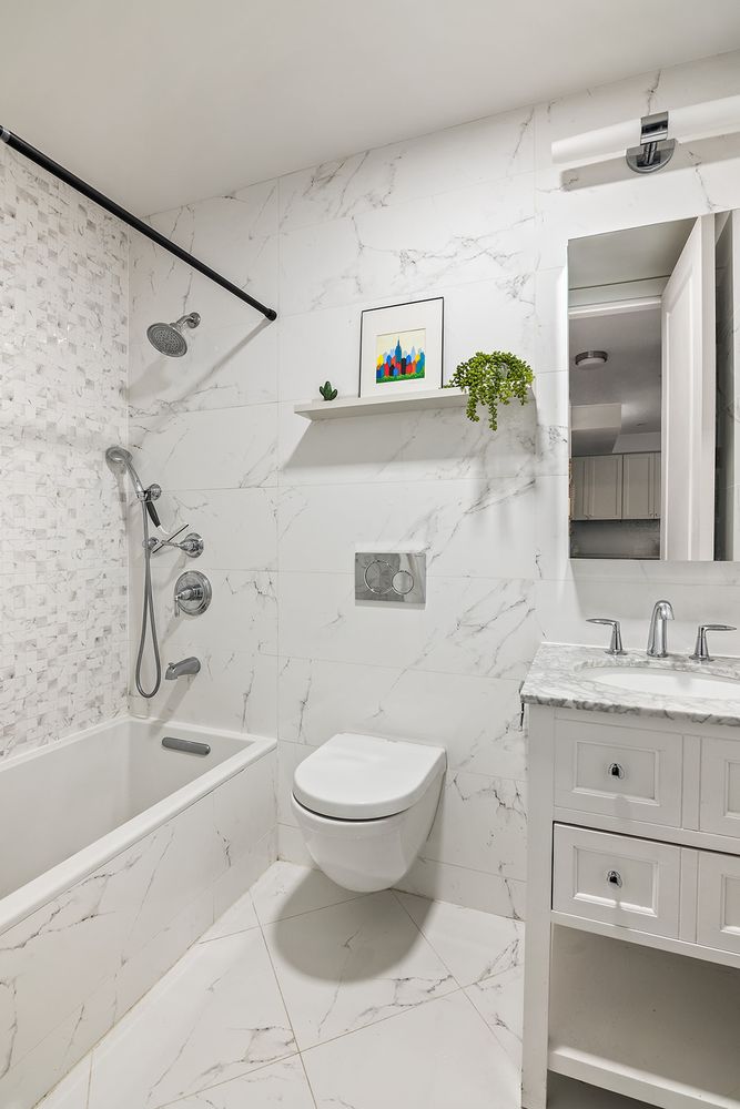 an outdoor sitting area with furniture