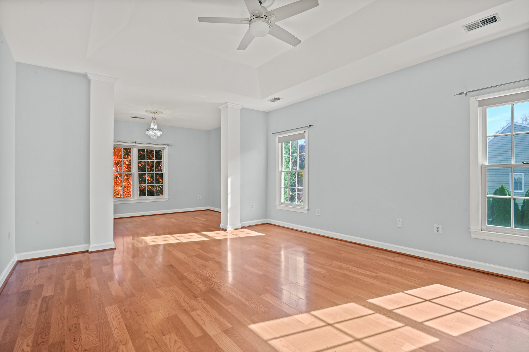 2628 Five Oaks Road Vienna, VA 22181 - Photo 19 of 40 wooden floor in an empty room with a window