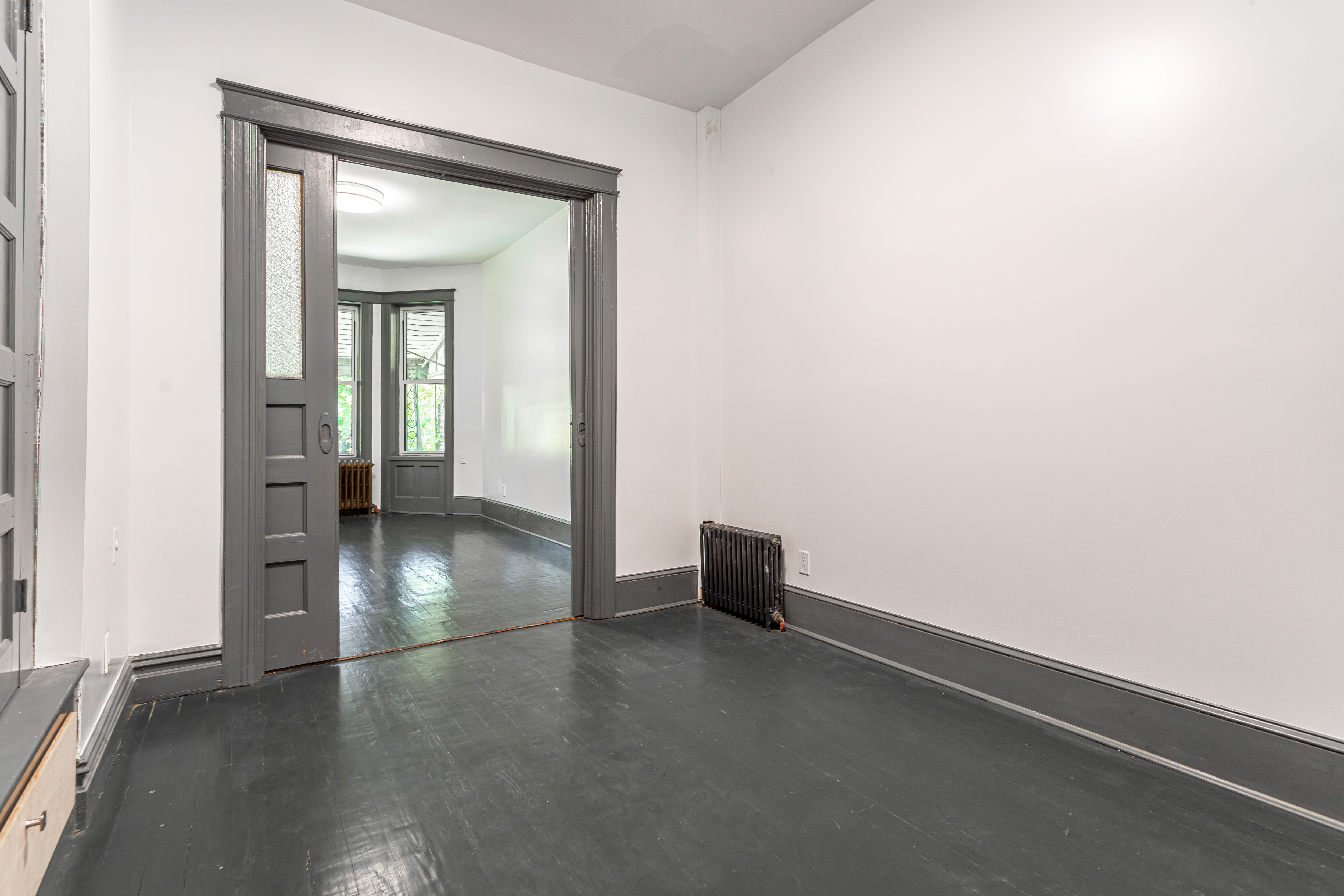 1191 Lincoln Place, Unit 1 Brooklyn, NY 11213 - Photo 5 of 13 an empty room and a gallery