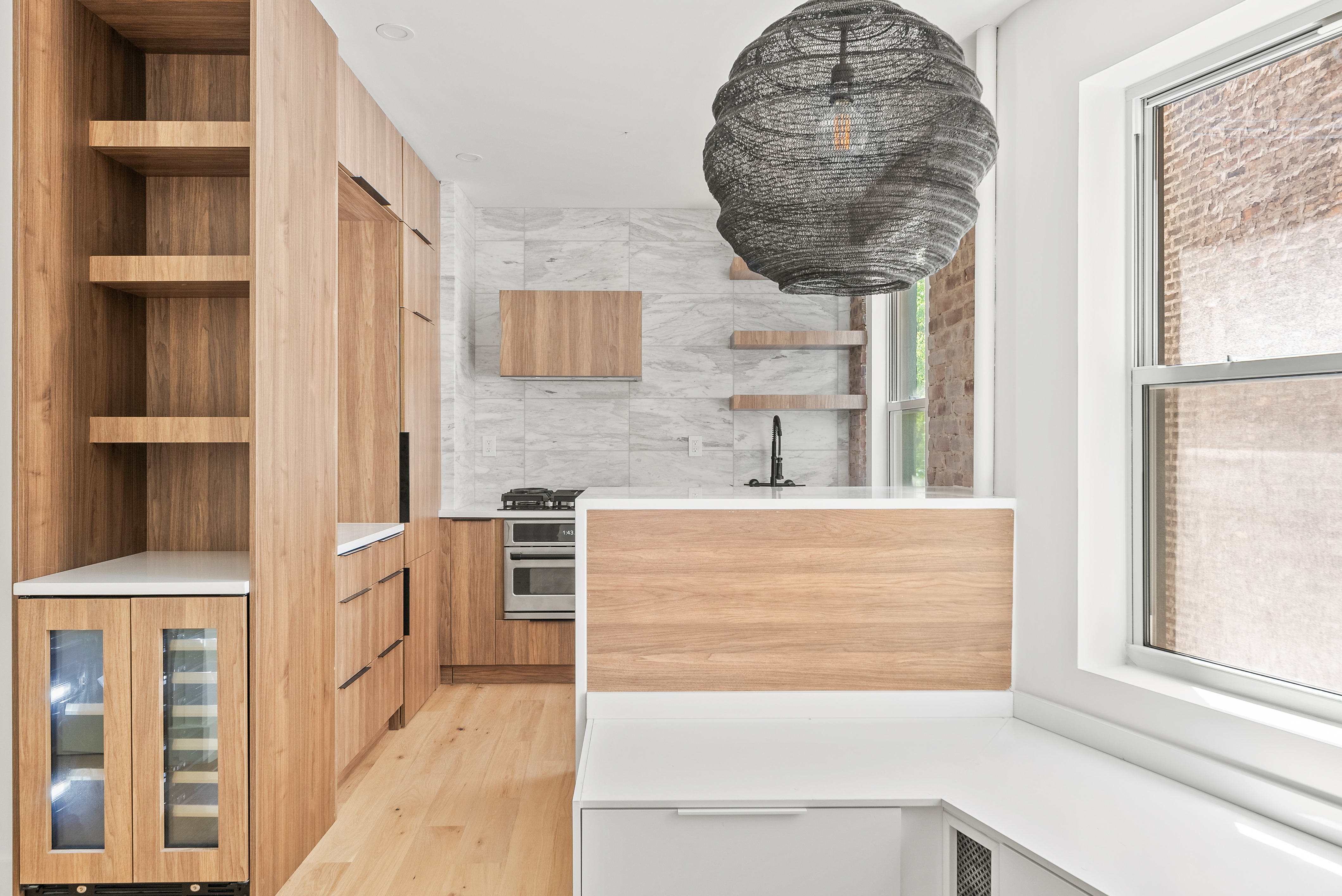 342 West 21st Street, Unit 3E Manhattan, NY 10011 - Photo 3 of 10 a bathroom with a sink and a mirror