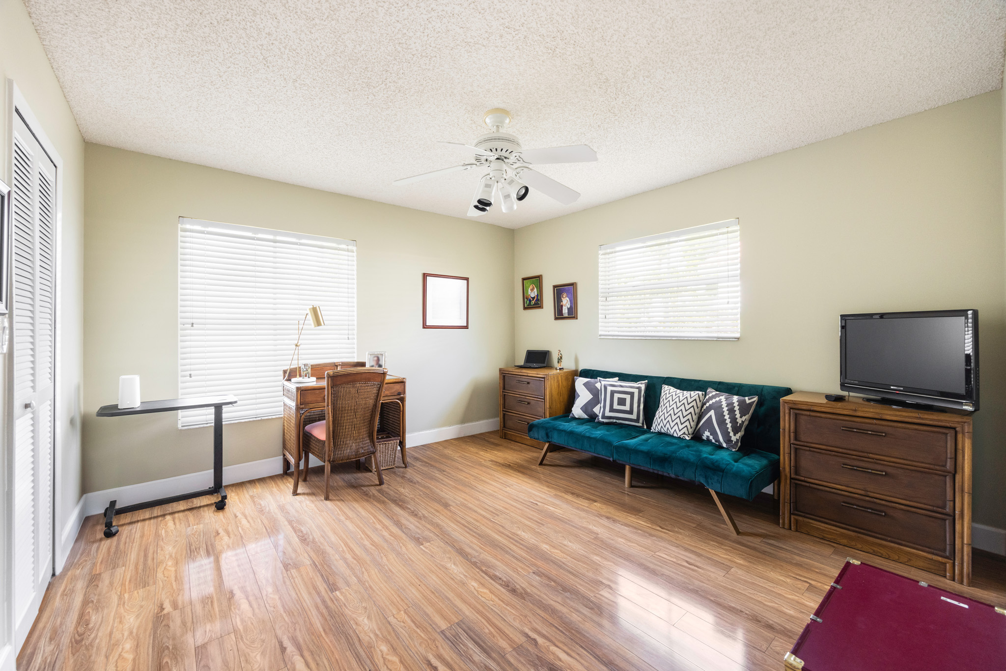 8610 Southwest 83rd Street Miami, FL 33143 - Photo 28 of 46 a living room with furniture and a wooden floor