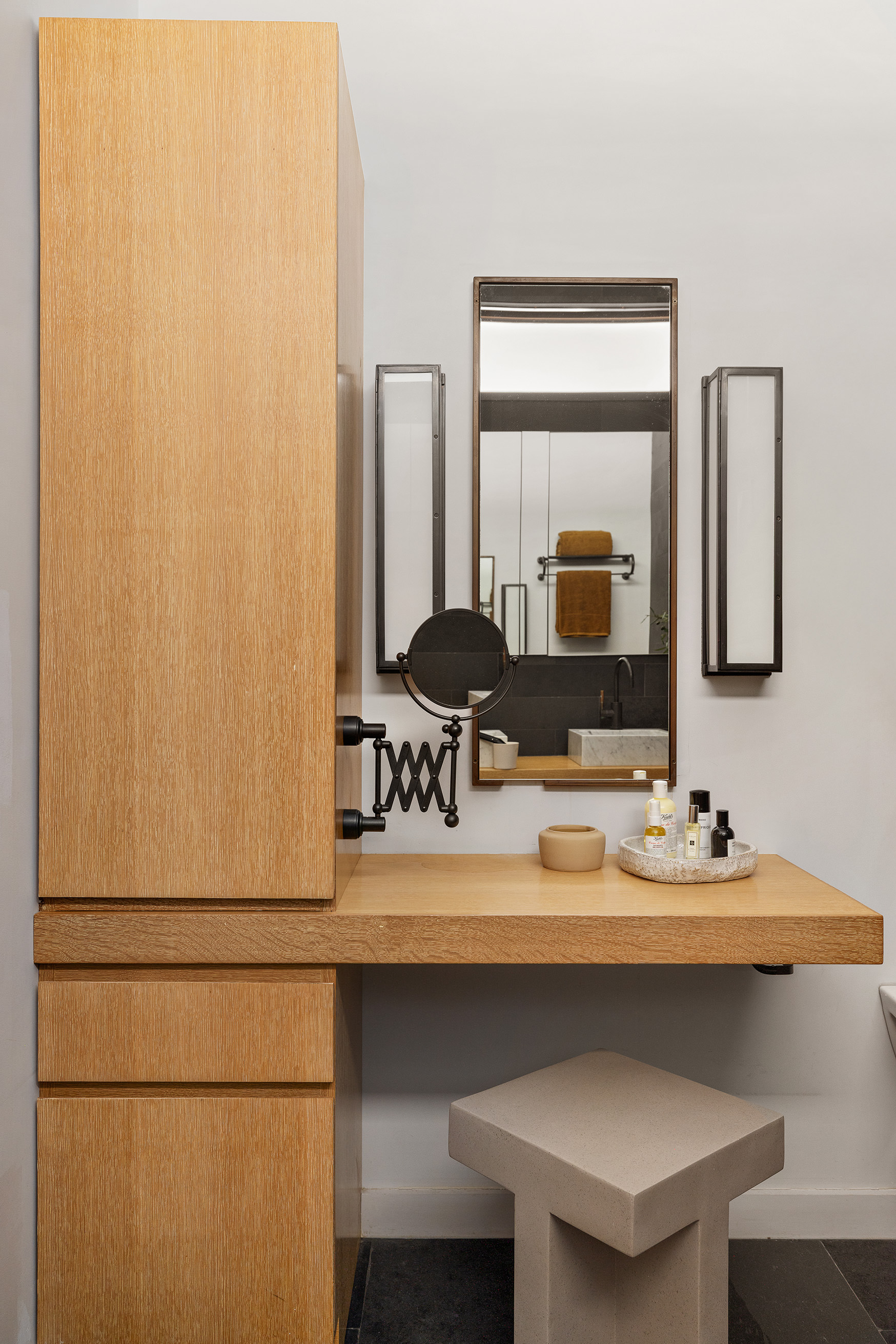 250 Mercer Street, Unit B706B707 Manhattan, NY 10012 - Photo 21 of 25 a bathroom with a sink and a mirror