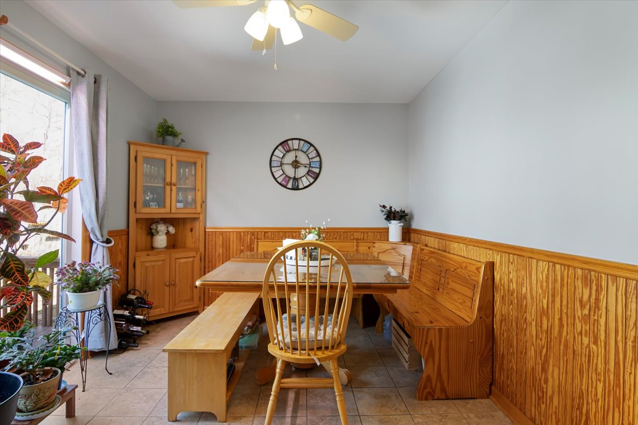 107 Kingston Road Parsippany, NJ 07054 - Photo 25 of 43 a view of a dining room with furniture and chandelier