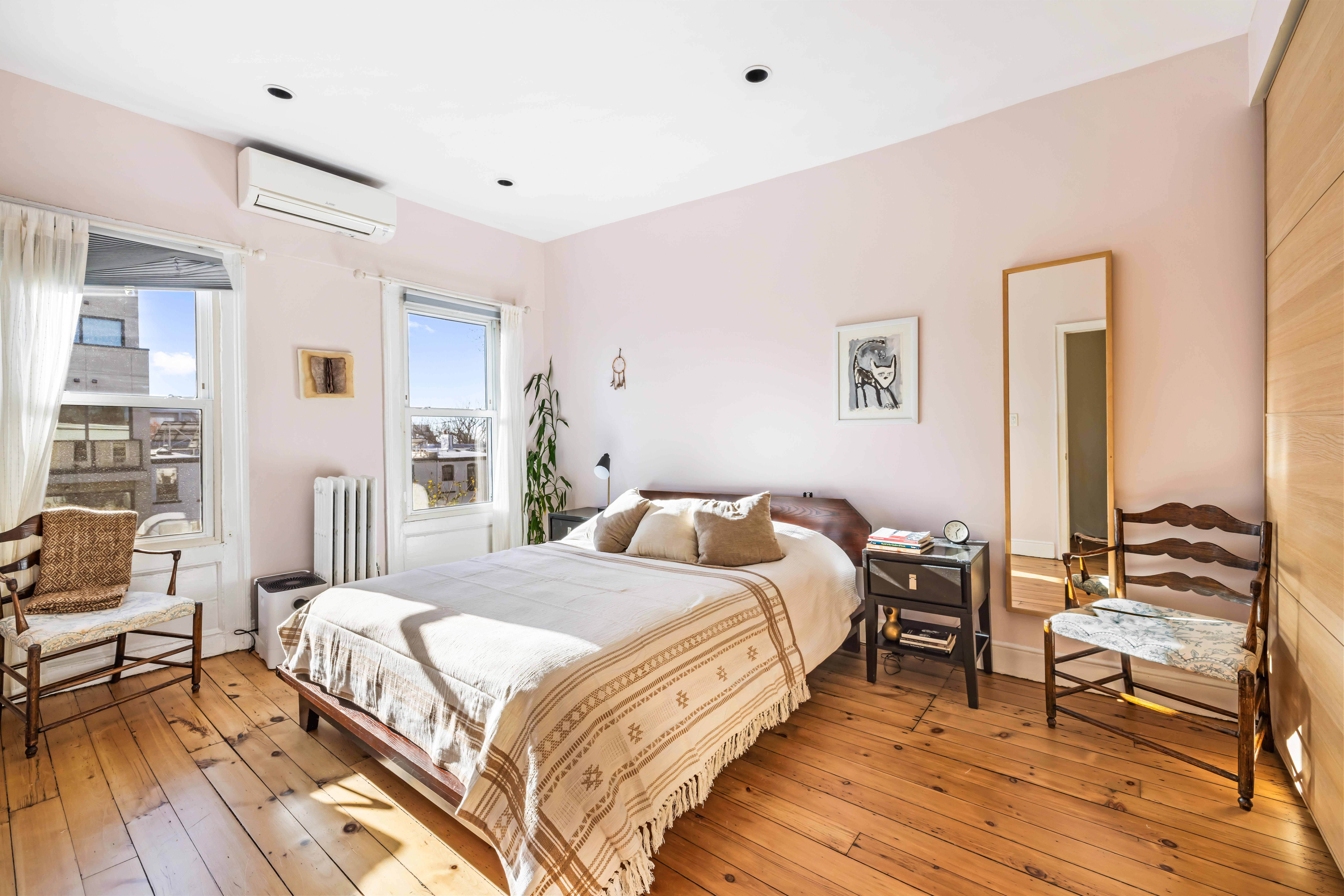 226 11th Street, Unit 2 Brooklyn, NY 11215 - Photo 8 of 19 a bedroom with a bed and wooden floor