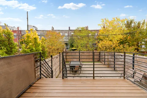 a view of a balcony with an ocean view