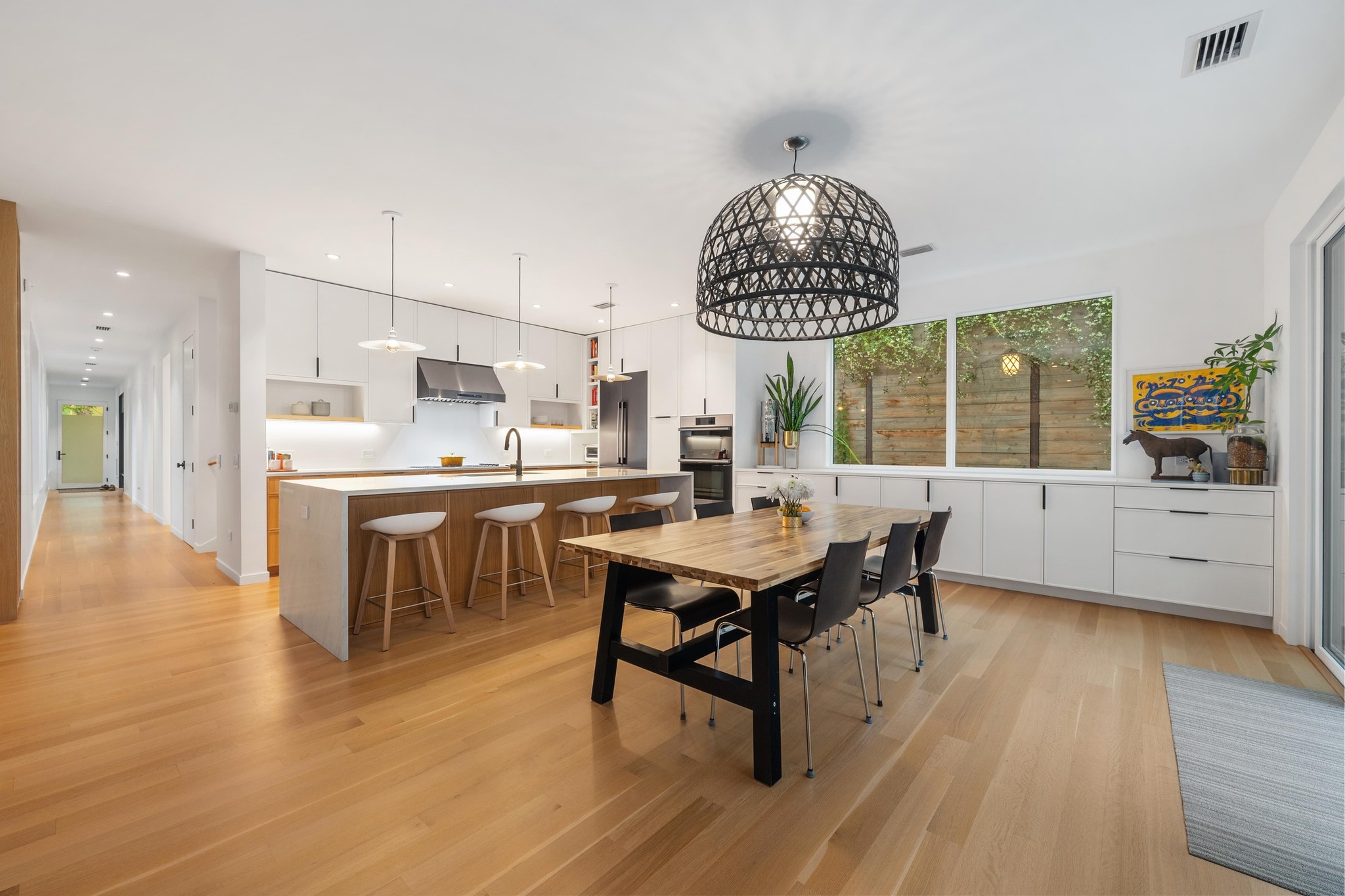 1206 Bickler Road Austin, TX 78704 - Photo 23 of 65 a view of a kitchen and dining room