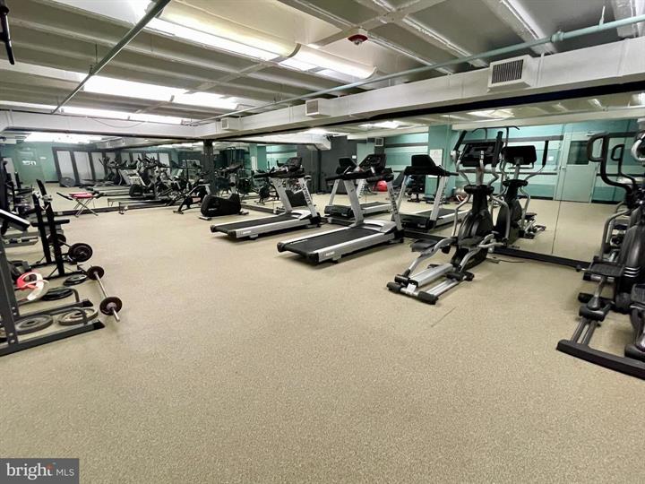 1101 3rd Street Southwest, Unit 206 Washington, DC 20024 - Photo 8 of 21 a view of a room with gym equipment
