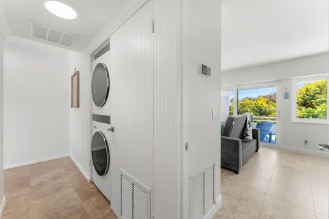 a view of utility room with windows