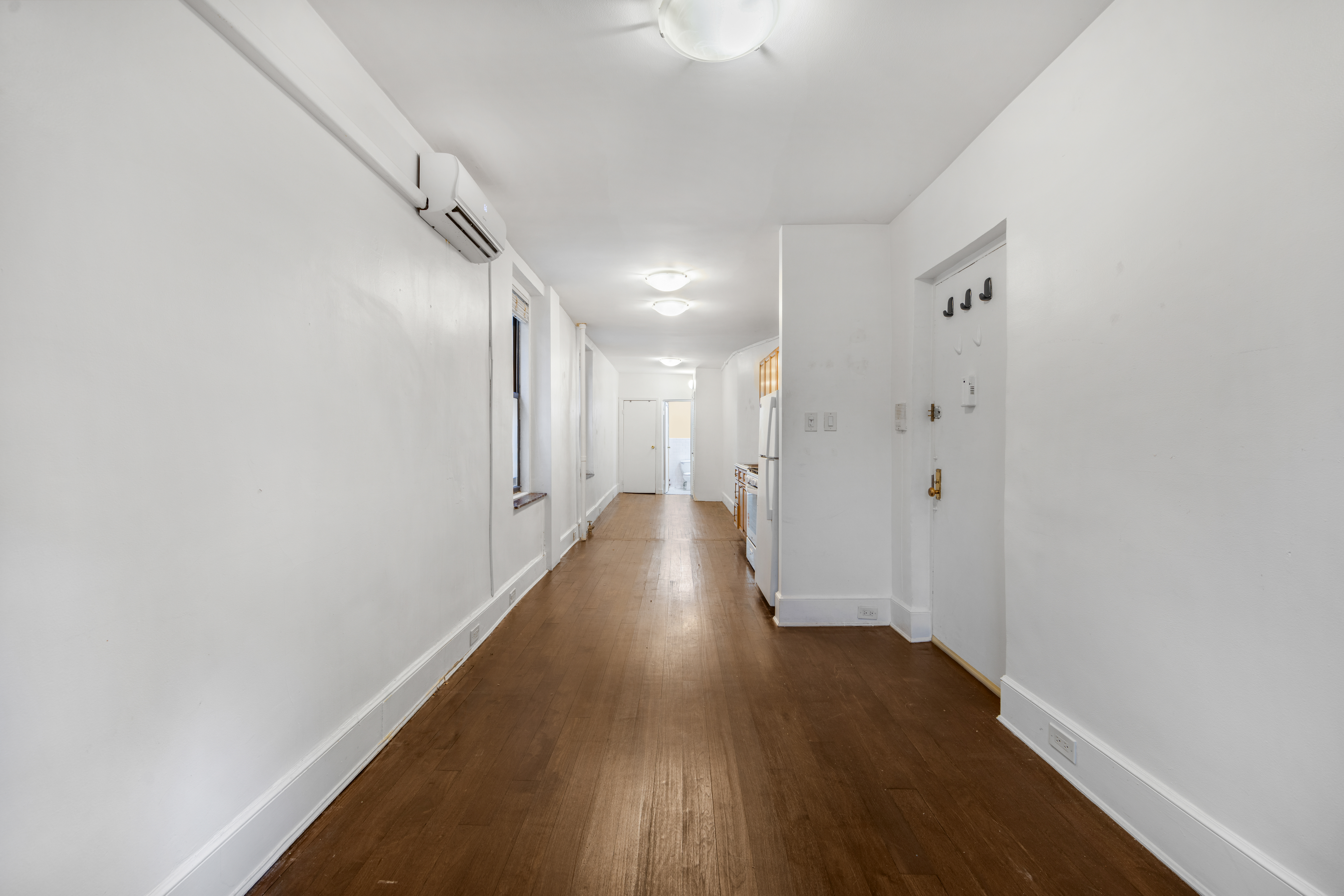 241 Mulberry Street, Unit 3 Manhattan, NY 10012 - Photo 2 of 8 a view of gallery with wooden floor