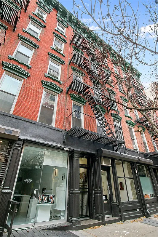 616 East 9th Street, Unit 4W Manhattan, NY 10009 - Photo 19 of 20 a view of brick building with many windows