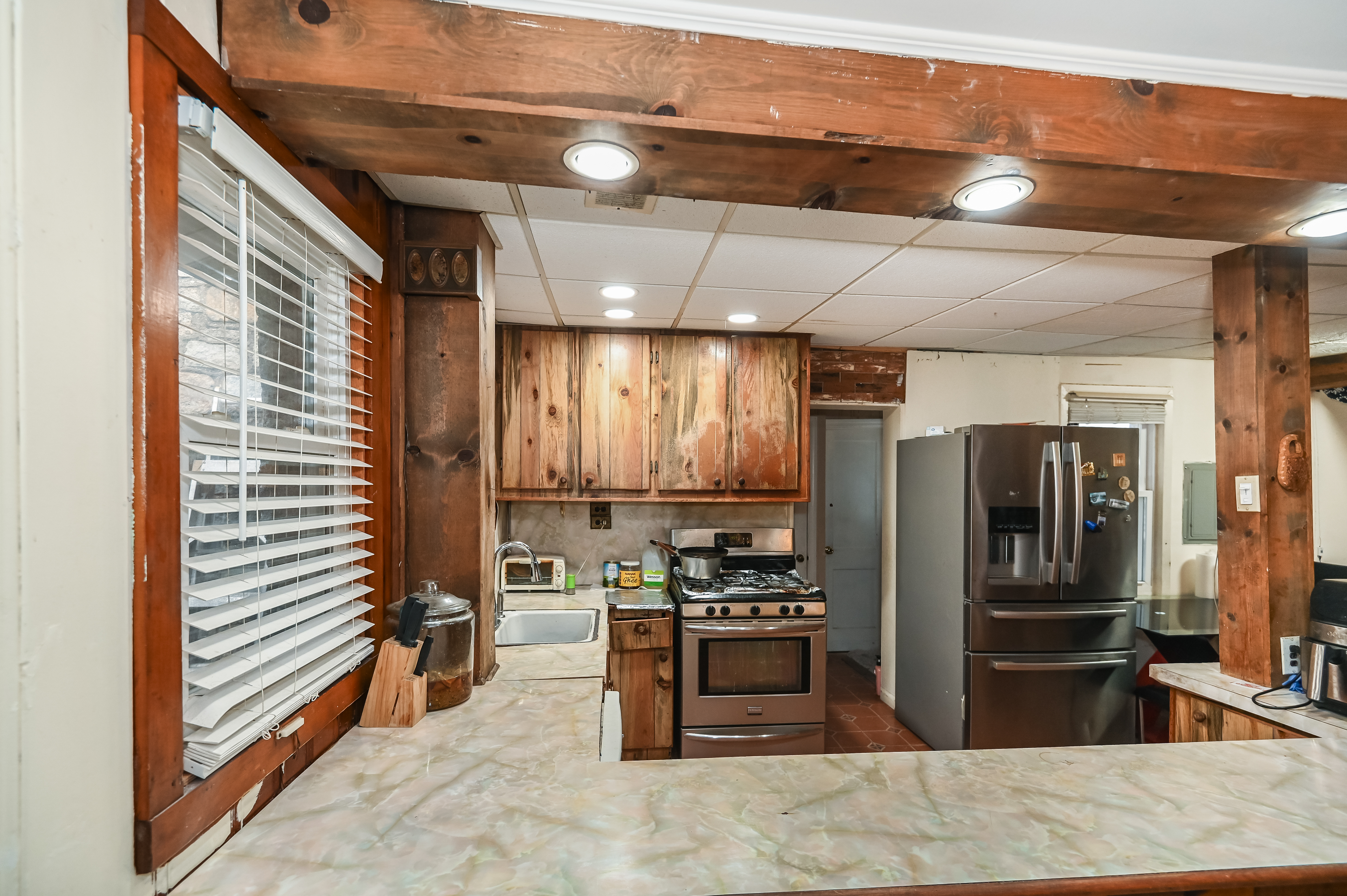 137 Hiawatha Boulevard Lake Hiawatha, NJ 07034 - Photo 10 of 21 a kitchen with stainless steel appliances kitchen island granite countertop a refrigerator oven a sink and dishwasher