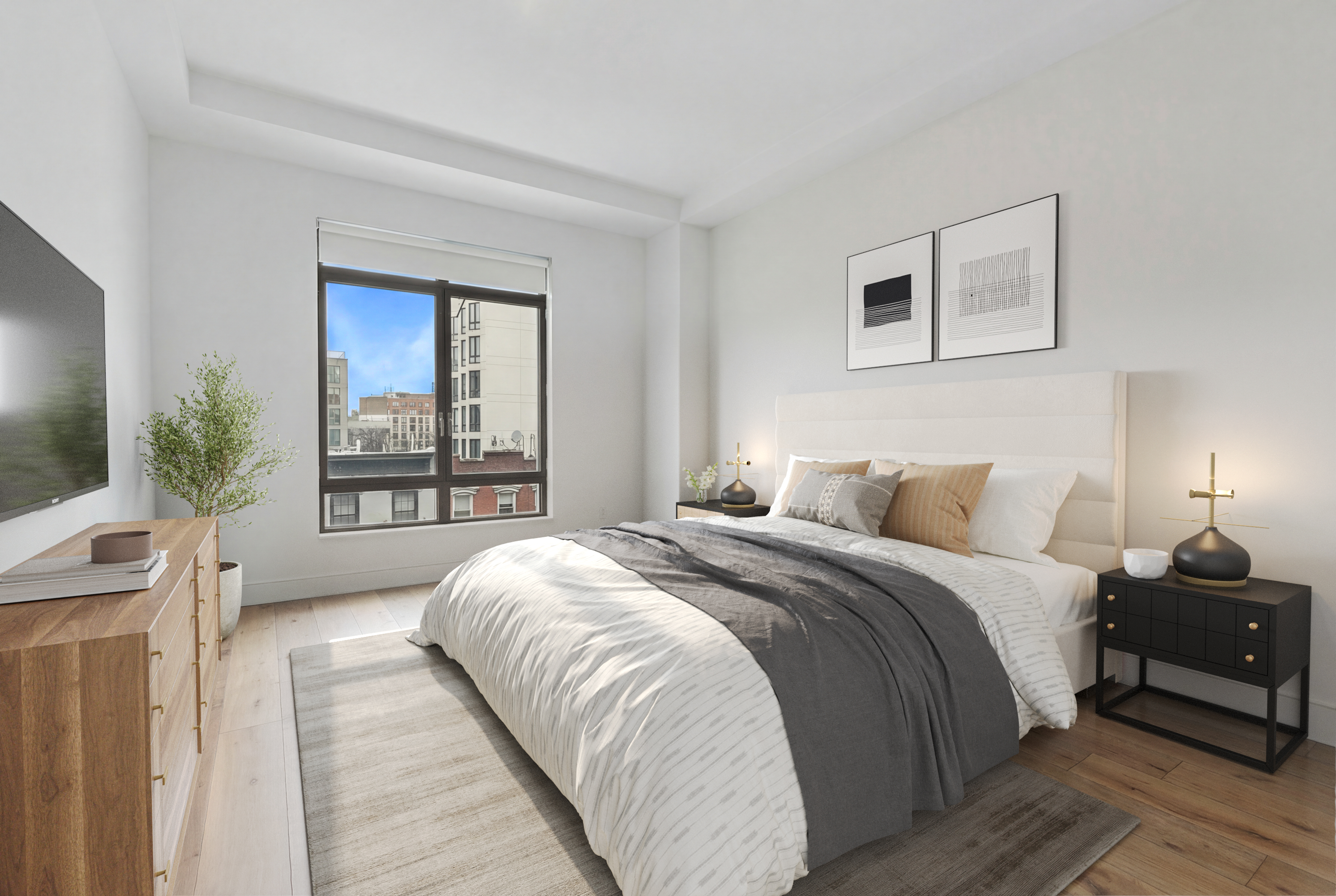 147 Hope Street, Unit 4A Brooklyn, NY 11211 - Photo 5 of 12 a bedroom with a large bed and a flat tv screen