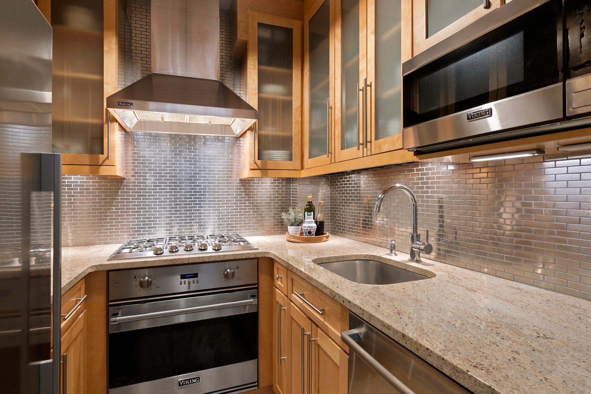 305 West 72nd Street, Unit 10A Manhattan, NY 10023 - Photo 5 of 12 a kitchen with a sink stove and microwave