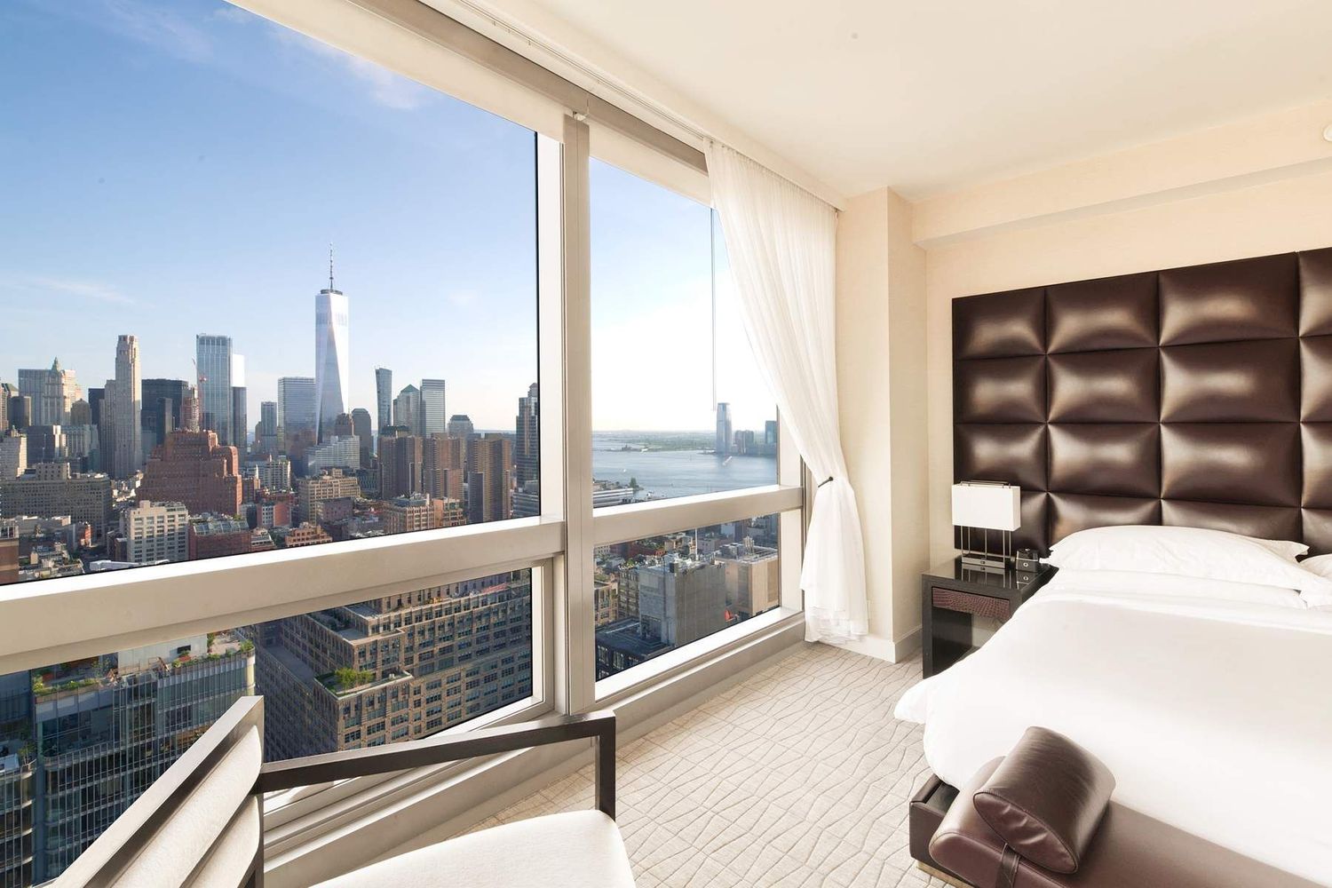 246 Spring Street, Unit 4103 Manhattan, NY 10013 - Photo 2 of 20 a view of a city from a balcony