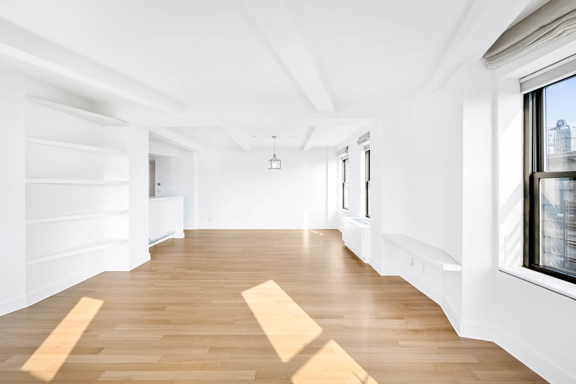 230 Riverside Drive, Unit 8D Manhattan, NY 10025 - Photo 5 of 19 a view of a hallway with wooden floor