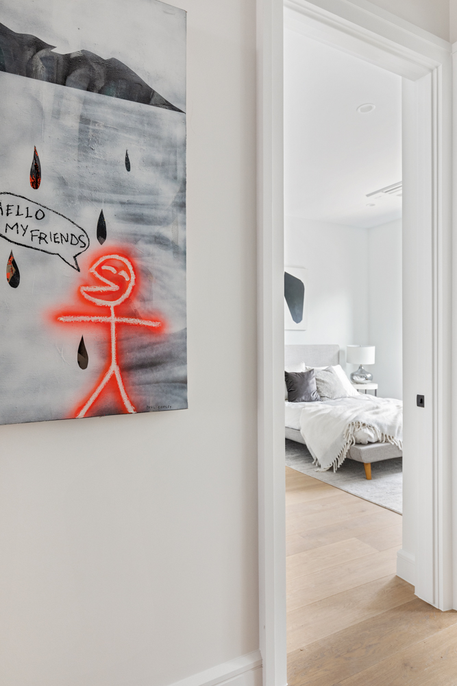 243 North 5th Street, Unit 2B Brooklyn, NY 11211 - Photo 13 of 14 a room with a rug and white walls