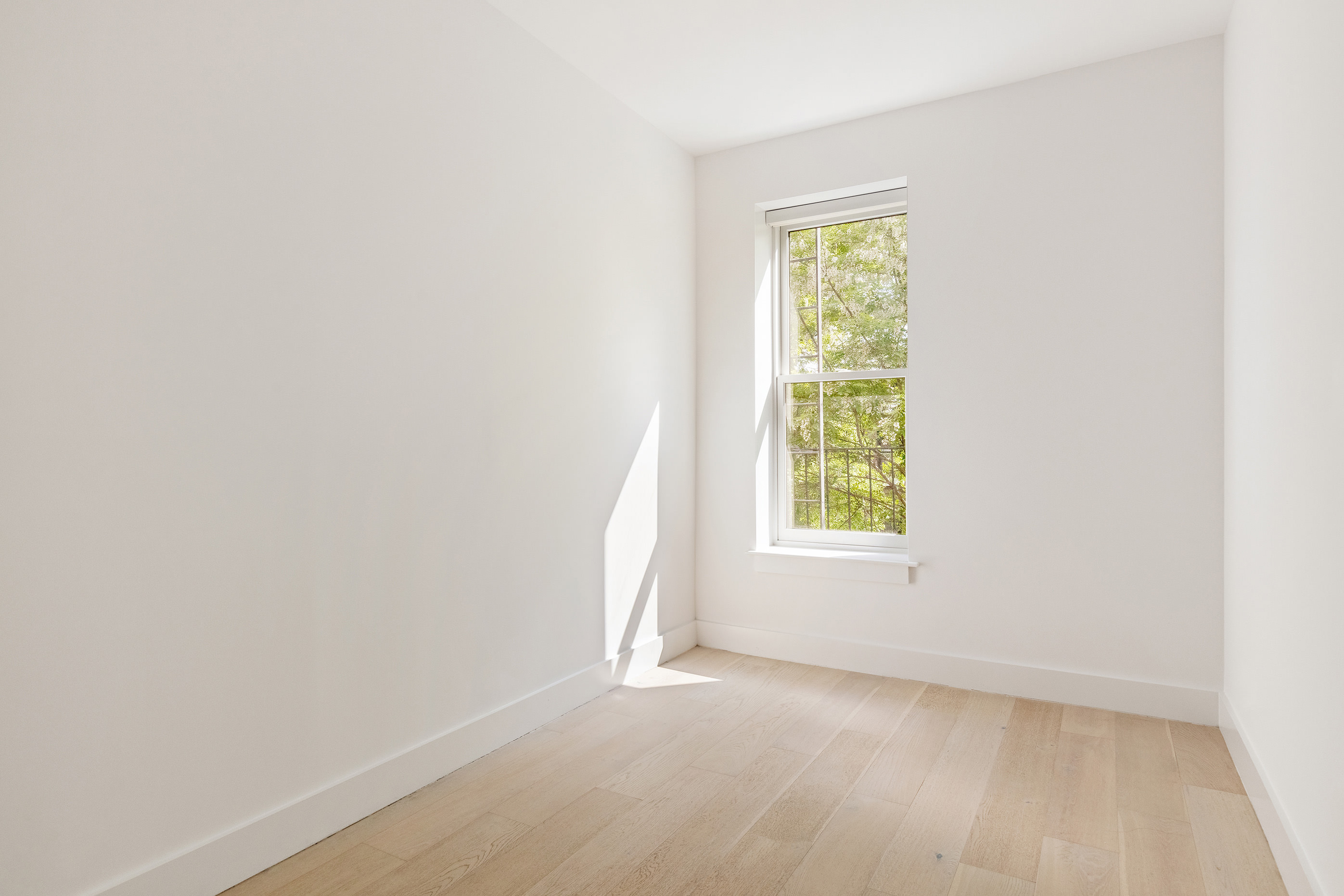 494 7th Street, Unit 3 Brooklyn, NY 11215 - Photo 6 of 9 a view of an empty room with a window