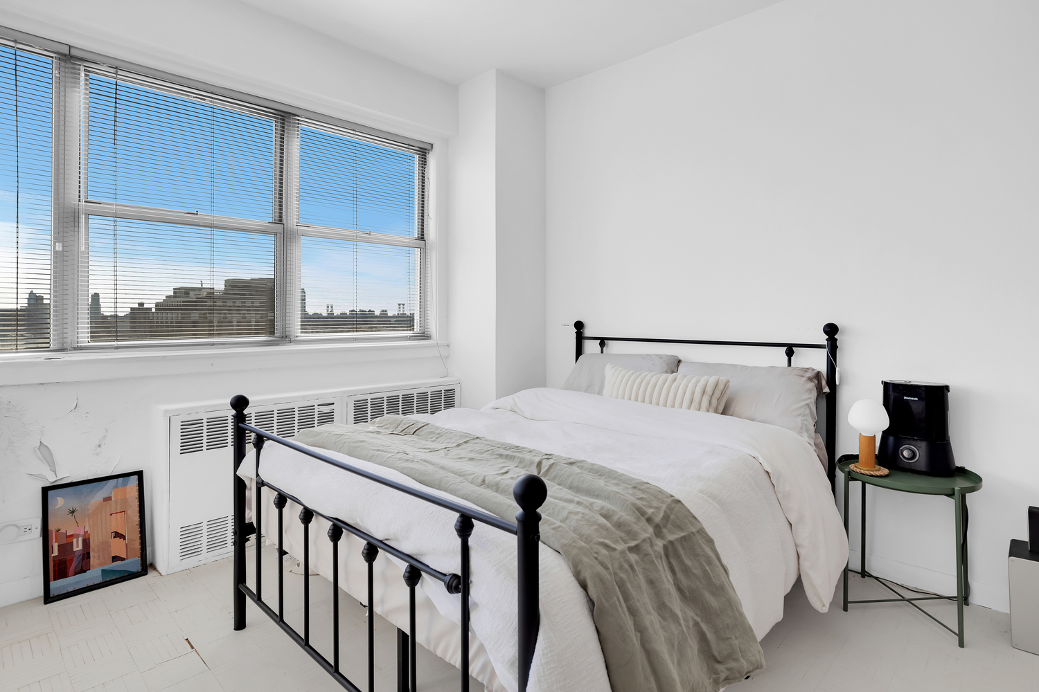 111 3rd Avenue, Unit 17G Manhattan, NY 10003 - Photo 3 of 9 a bedroom with a bed and a window