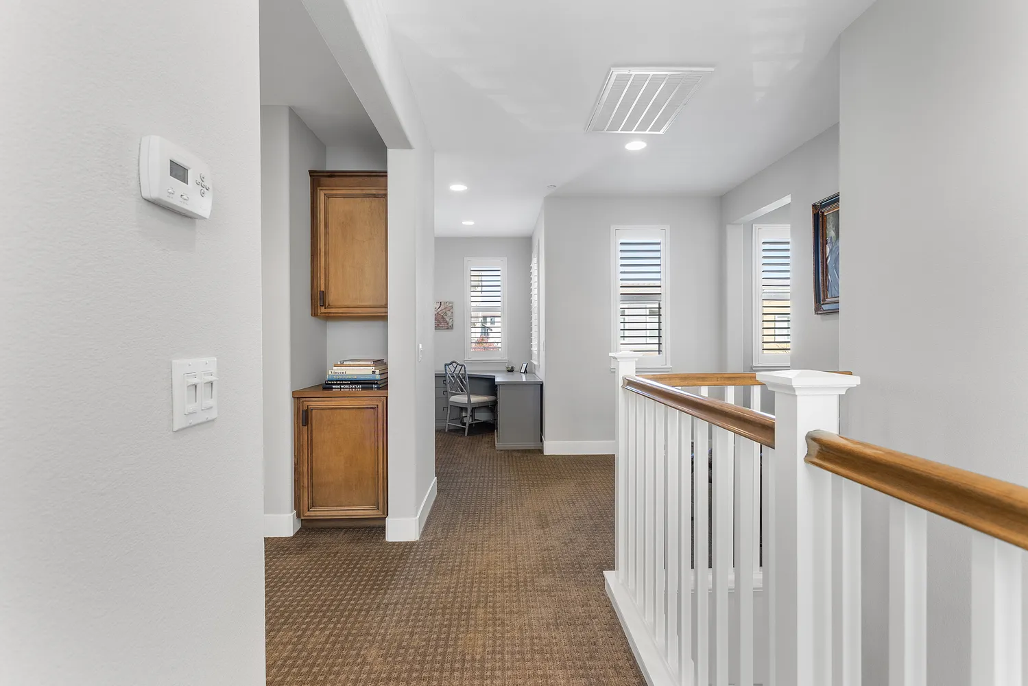 a spacious bedroom with a bed and furniture