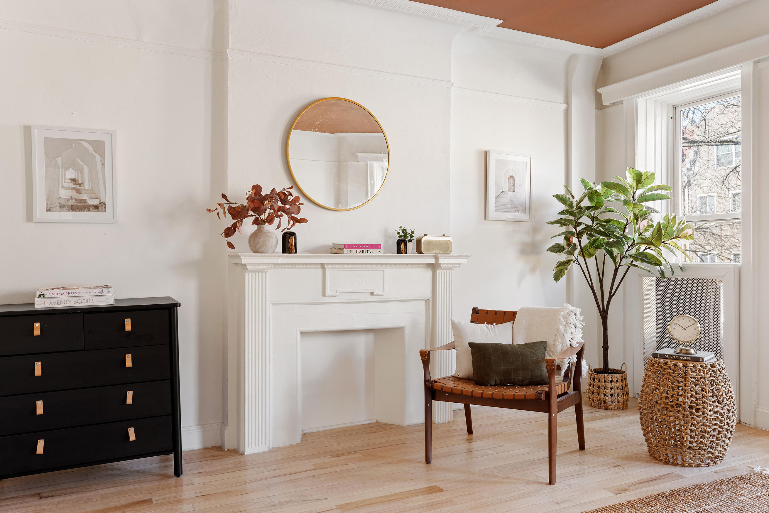 259 New York Avenue Brooklyn, NY 11216 - Photo 15 of 25 a living room with furniture a potted plant and a fireplace