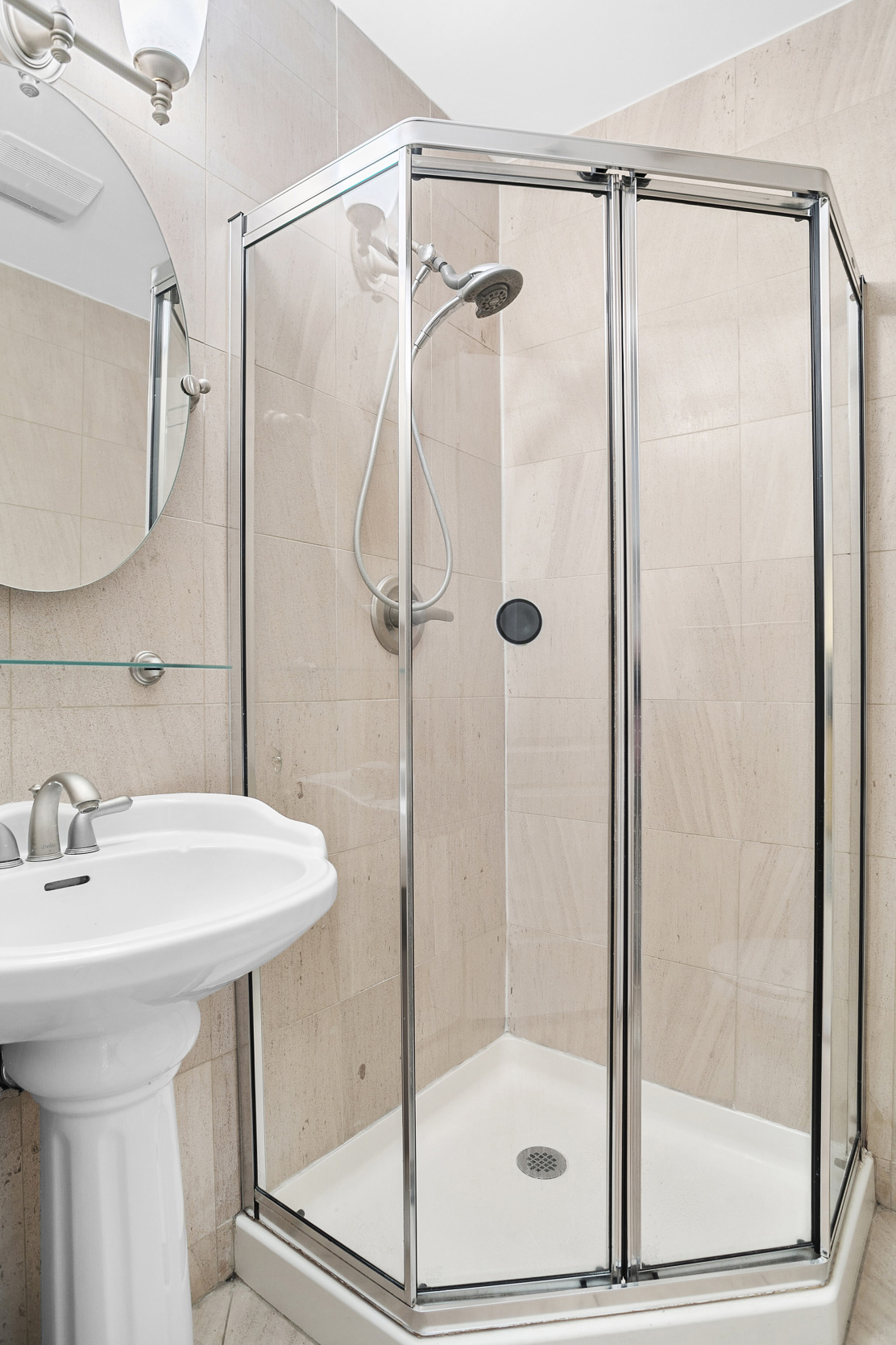 330 Bergen Street, Unit 4D Brooklyn, NY 11217 - Photo 5 of 9 a bathroom with a shower and a sink