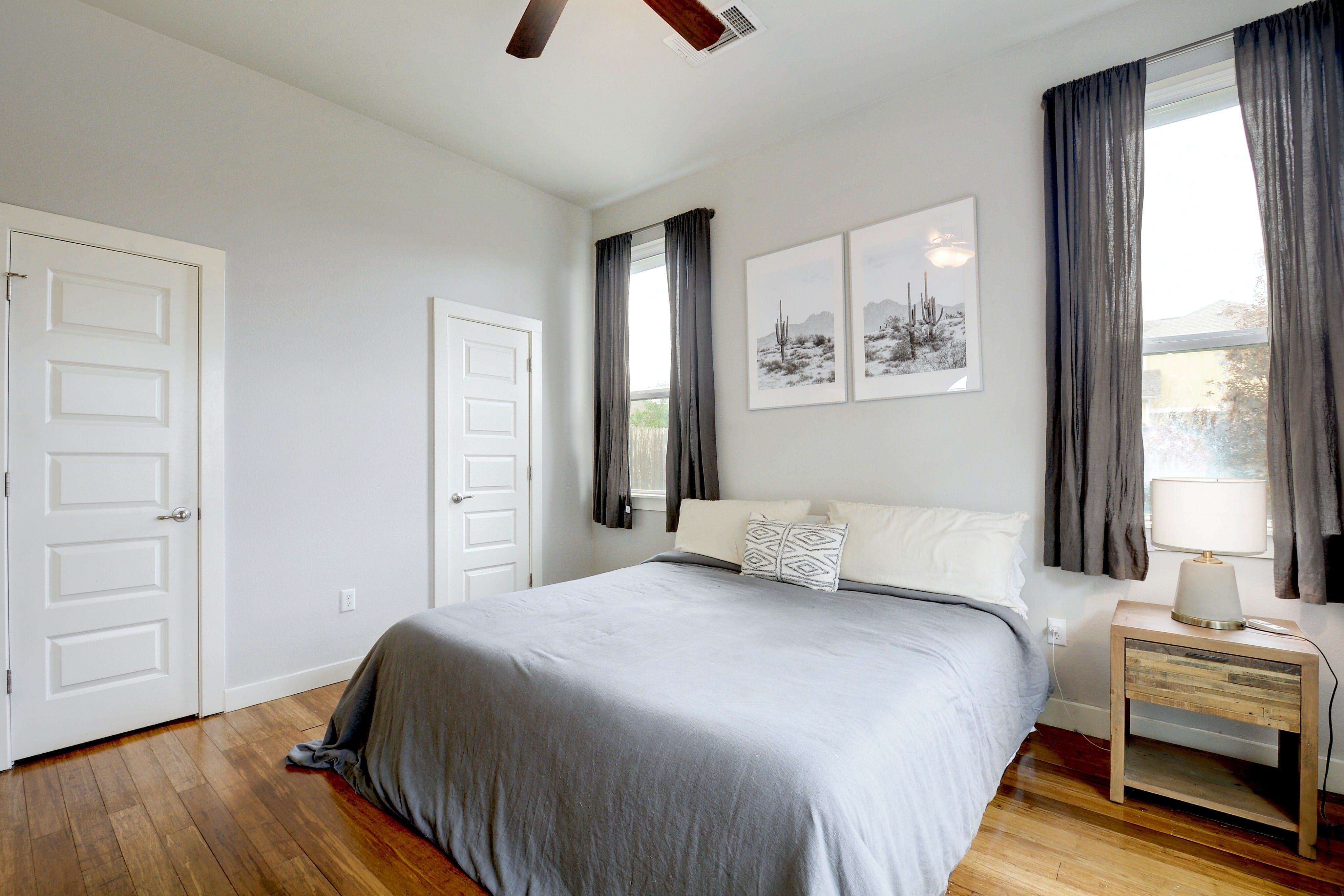 5400 Daimler Drive Austin, TX 78744 - Photo 13 of 27 a bedroom with a bed and a window