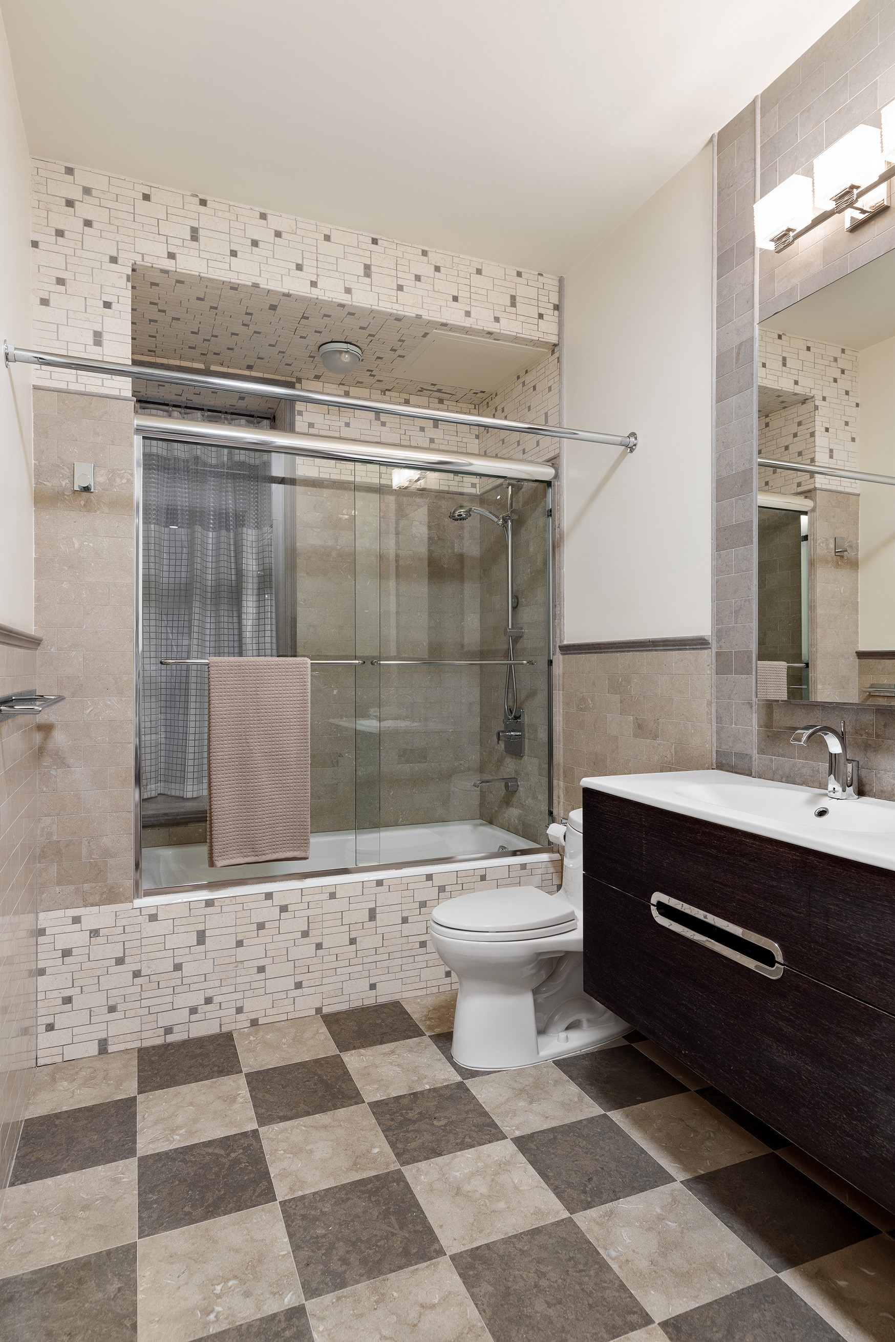 137 Riverside Drive, Unit 2D Manhattan, NY 10024 - Photo 9 of 20 a bathroom with a sink toilet and shower