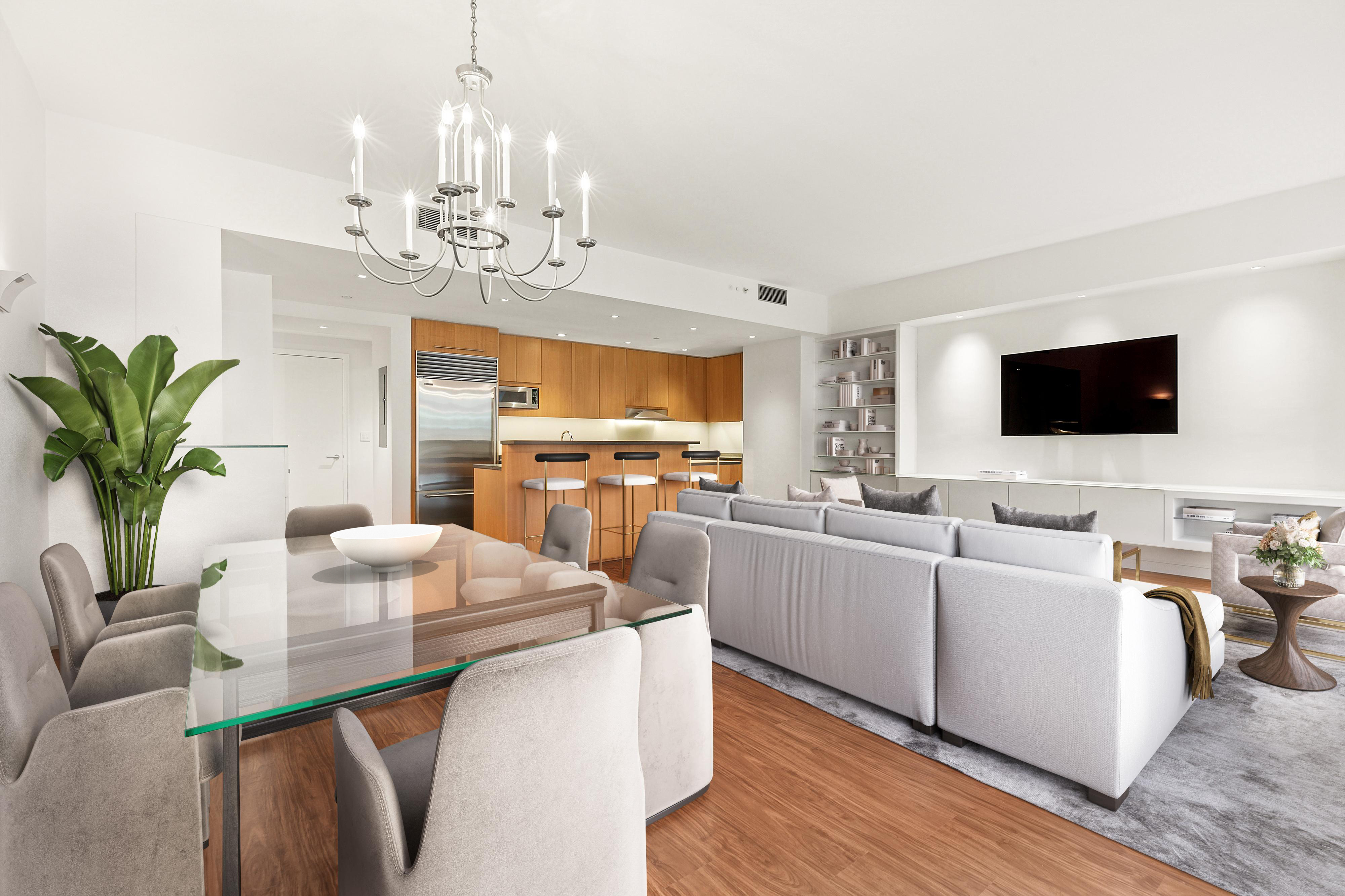 255 Hudson Street, Unit TH1 Manhattan, NY 10013 - Photo 3 of 10 a living room with furniture a chandelier and a flat screen tv