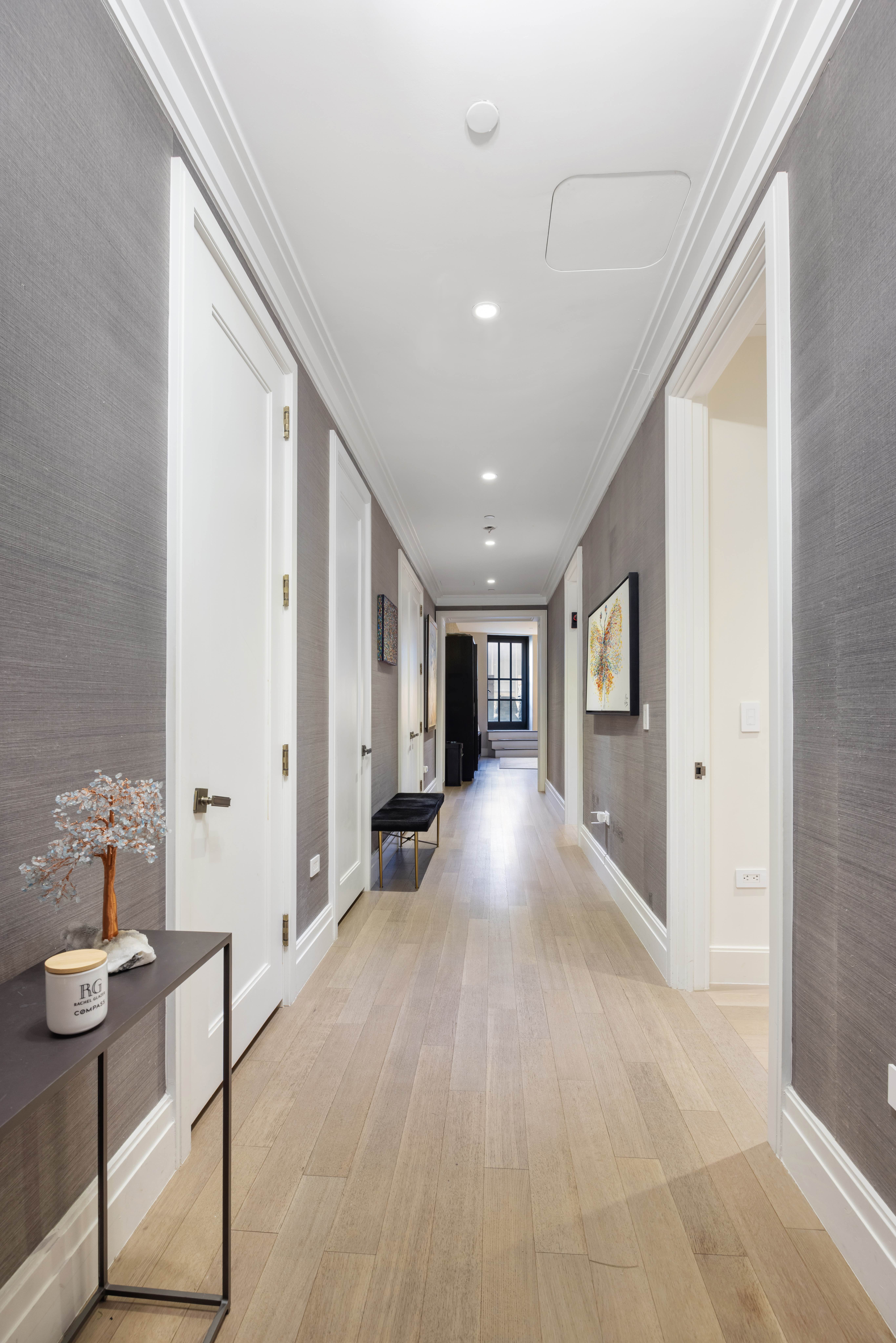 100 Barclay Street, Unit 16G Manhattan, NY 10007 - Photo 15 of 28 a view of a livingroom with furniture and window